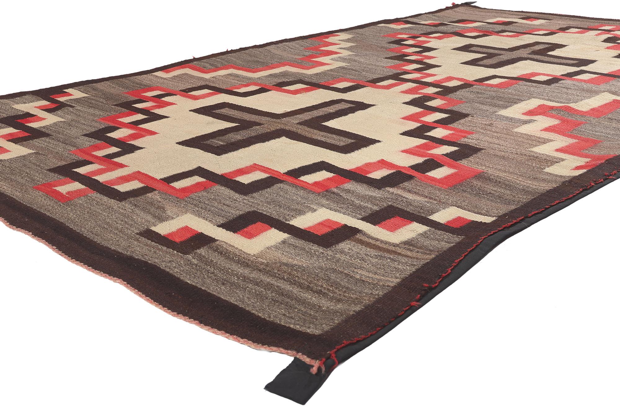 78563 Antique Ganado Navajo Rug, 05'06 x 09'03. 
Emanating Native American design with incredible detail and texture, this handwoven antique Navajo Ganado rug is a captivating vision of woven beauty. The eye-catching geometric pattern and earthy