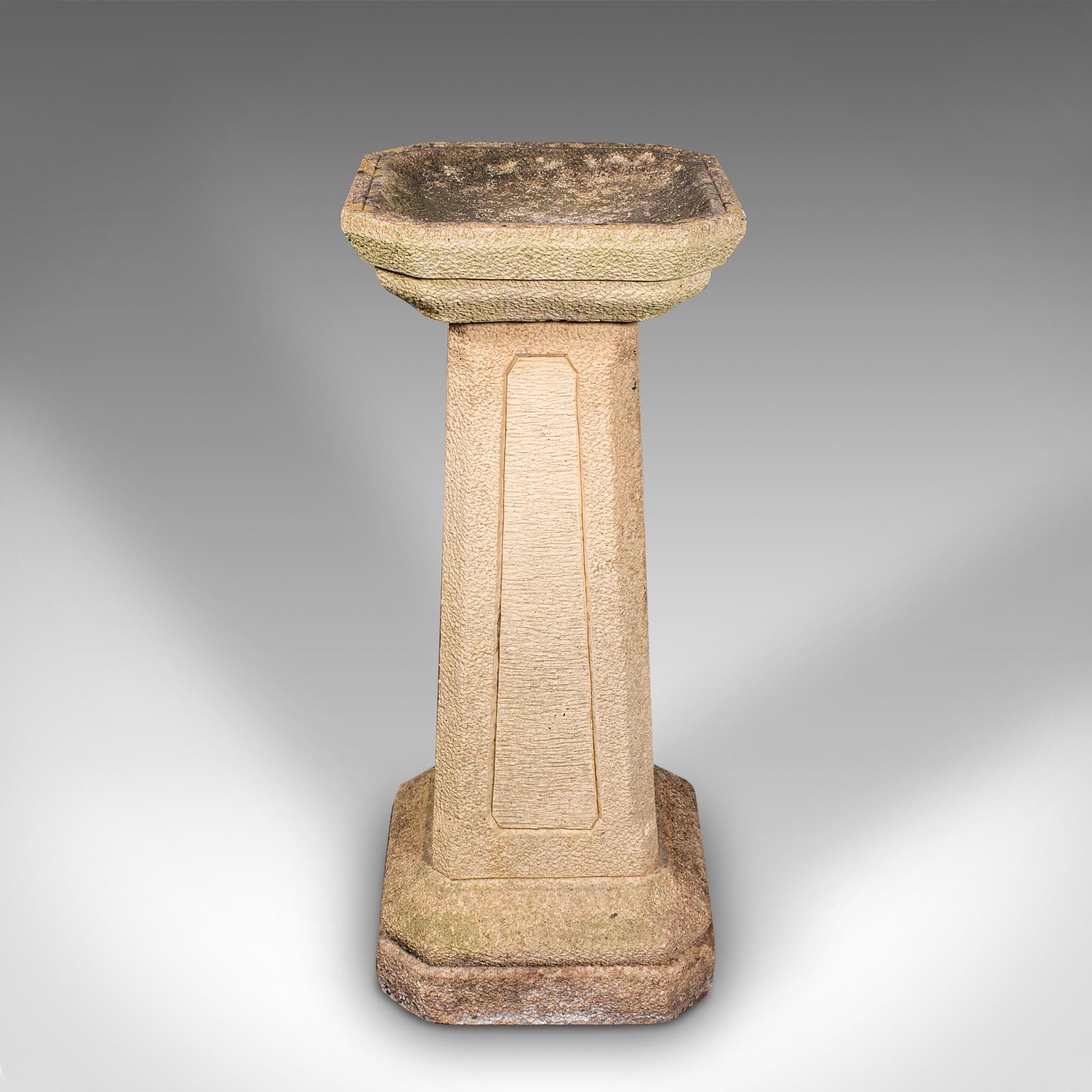 This is an antique garden bird bath. An English, reconstituted stone pedestal with inset trough, dating to the Edwardian period, circa 1910.

Pleasingly weathered appearance, to attract birds to the garden
Displaying a desirable aged patina with