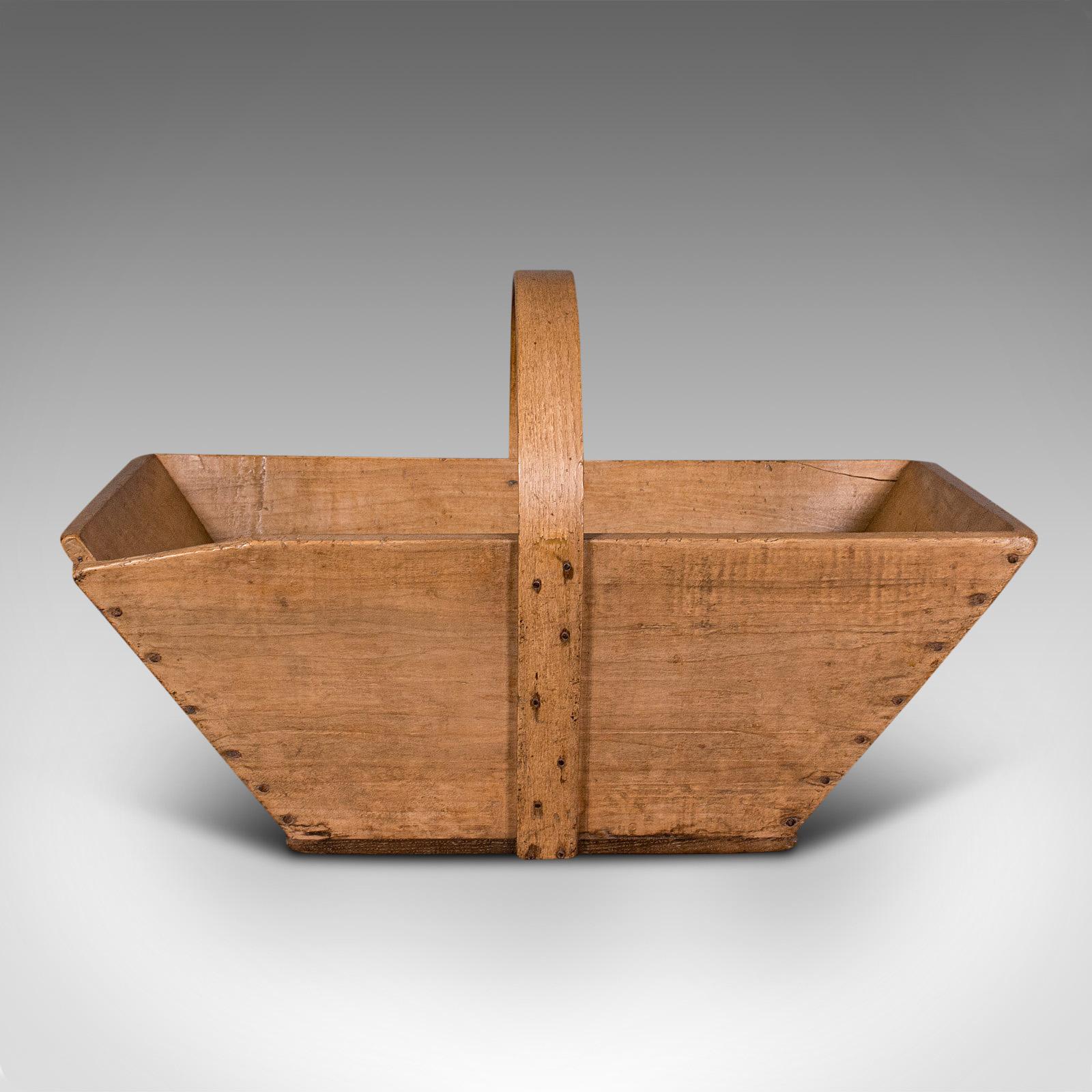 This is an antique garden trug. A French, pine horticulture basket, dating to the Victorian period, circa 1900.

Delightful antique trug ideal for the garden or display
Displaying a desirable aged patina throughout
French pine shows fine grain