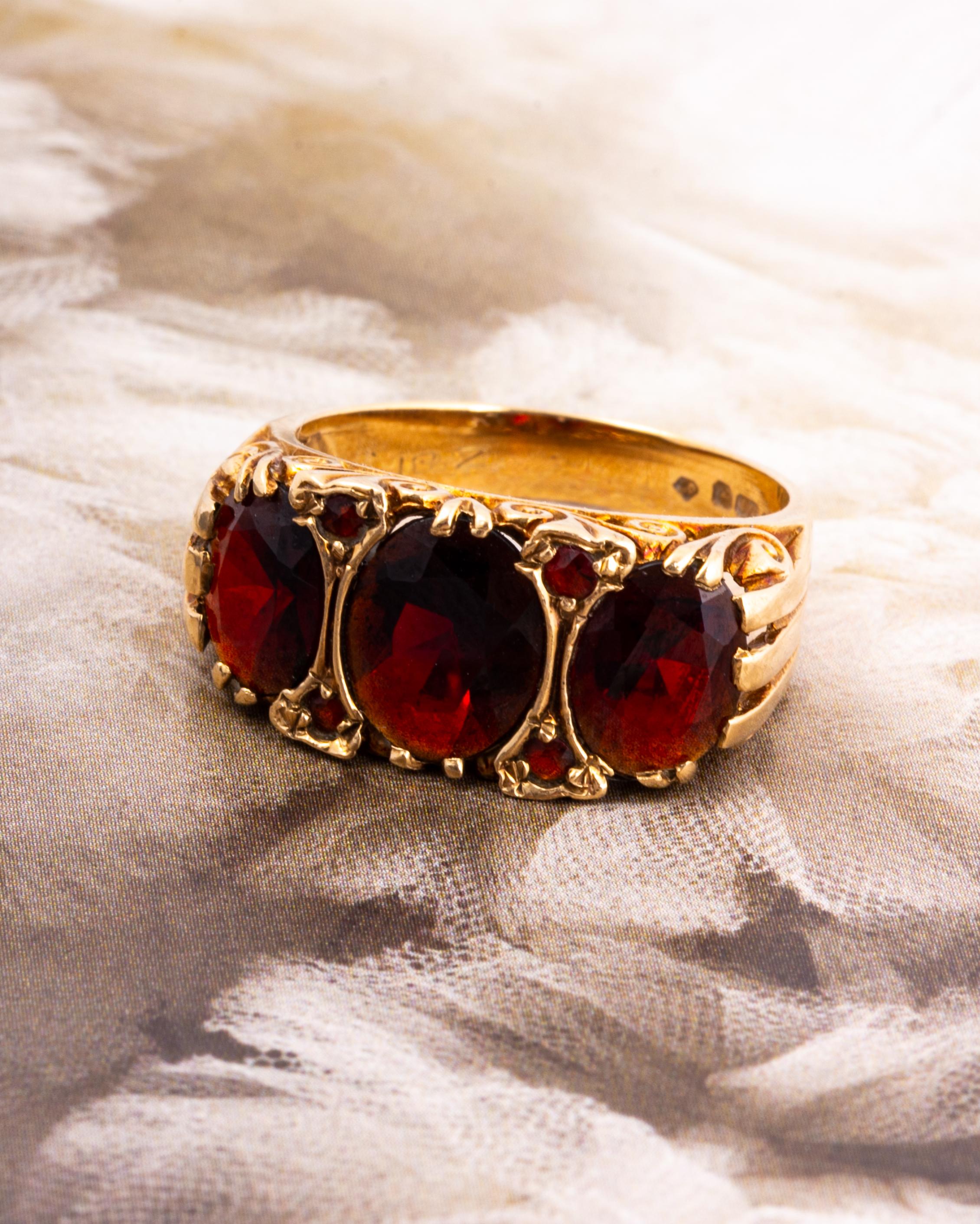 Oval Cut Antique Garnet and 9 Carat Gold Three-Stone Ring
