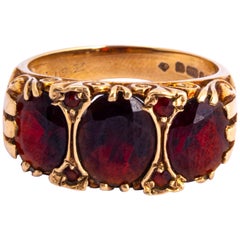 Antique Garnet and 9 Carat Gold Three-Stone Ring Antique Garnet and 9 Carat Gold Three-Stone Ring