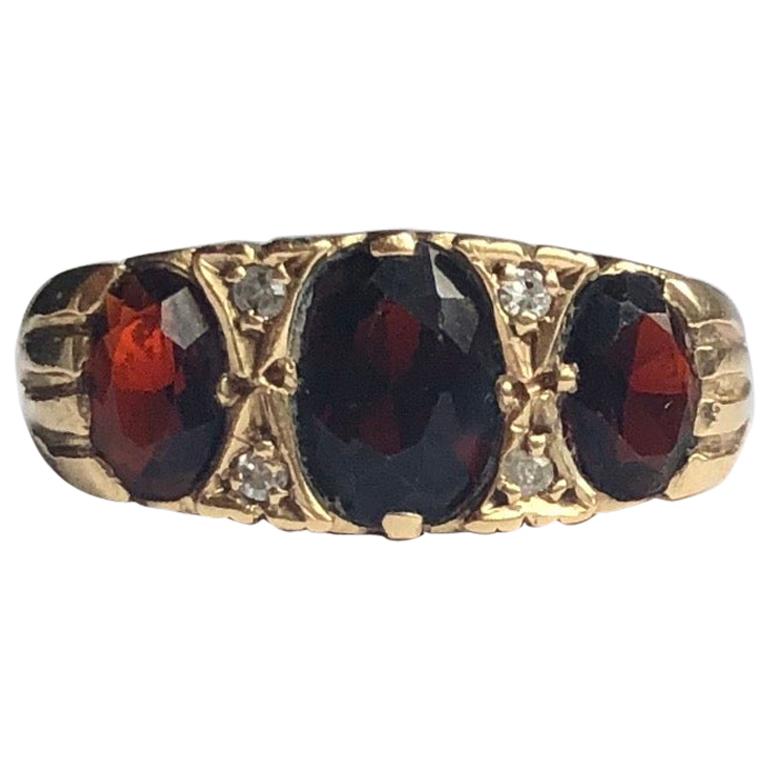 Antique Garnet and Diamond 9 Carat Gold Three-Stone Ring