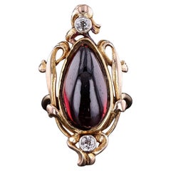 Antique Garnet and Diamond Ring of 14k Gold