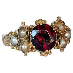 Antique Garnet and pearl 9 Carat Gold Ring