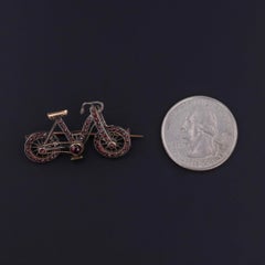 Antique Garnet Bicycle Brooch