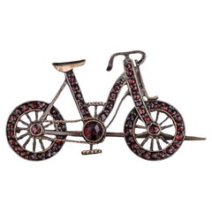 Antique Garnet Bicycle Brooch