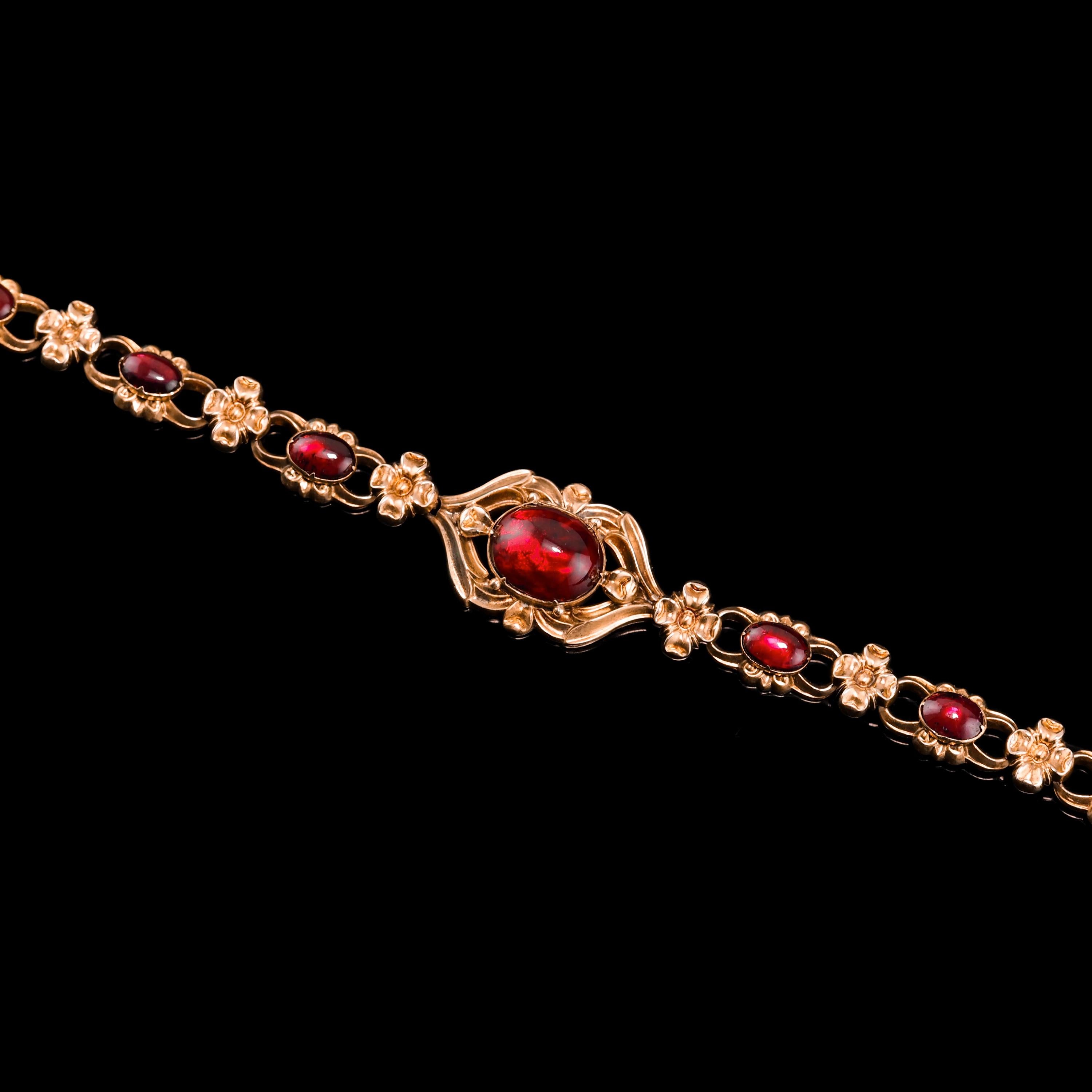 Women's or Men's Antique Garnet Bracelet Victorian 18k Gold Cabochon Floral Design, circa 1840 For Sale