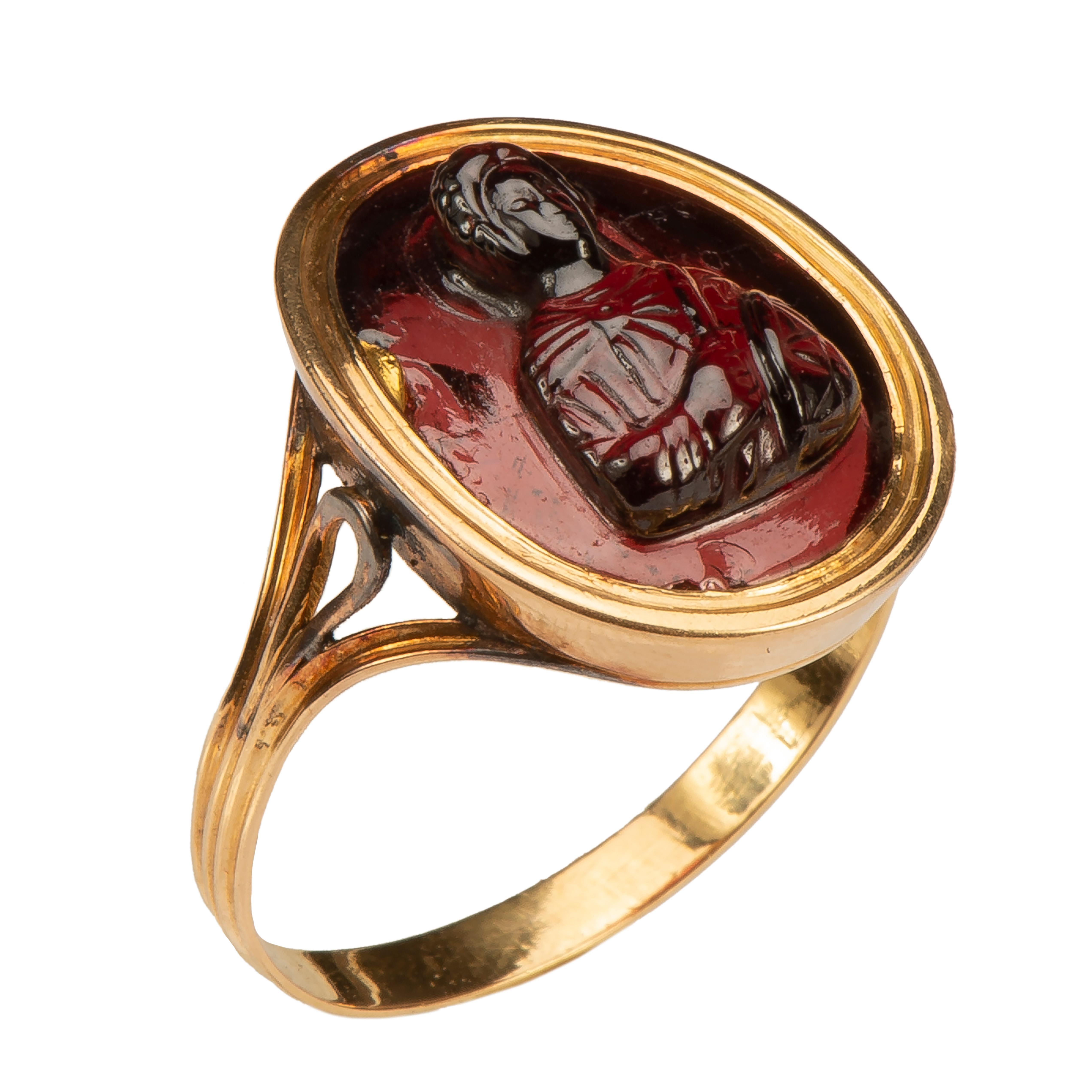 Ring with Cameo of Saint Procopius
Cameo, Middle Byzantine, c. 11th-12th century; mount, 19th century
Gold, garnet
Weight 4.4 gr; Circumference 60.98 mm.; US size 9 1/2; UK S ¾

Gold ring with plain hoop on the interior and fluted on the exterior.