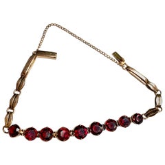 Antique Garnet Link 9 Karat Yellow Gold Bracelet with Safety Chain