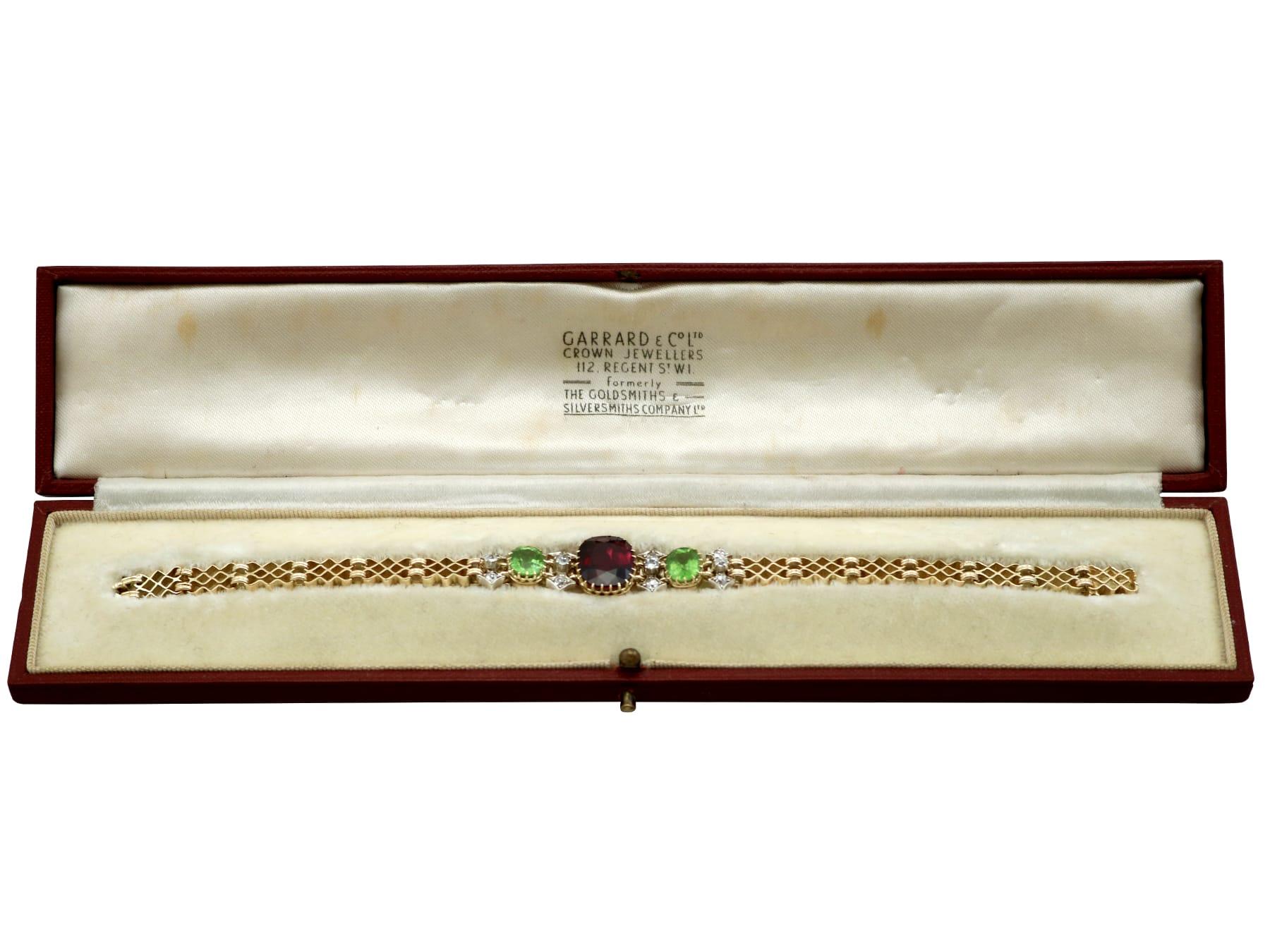 Antique Garnet, Peridot and Diamond, 15 Karat Yellow Gold Bracelet Circa 1910 For Sale 11
