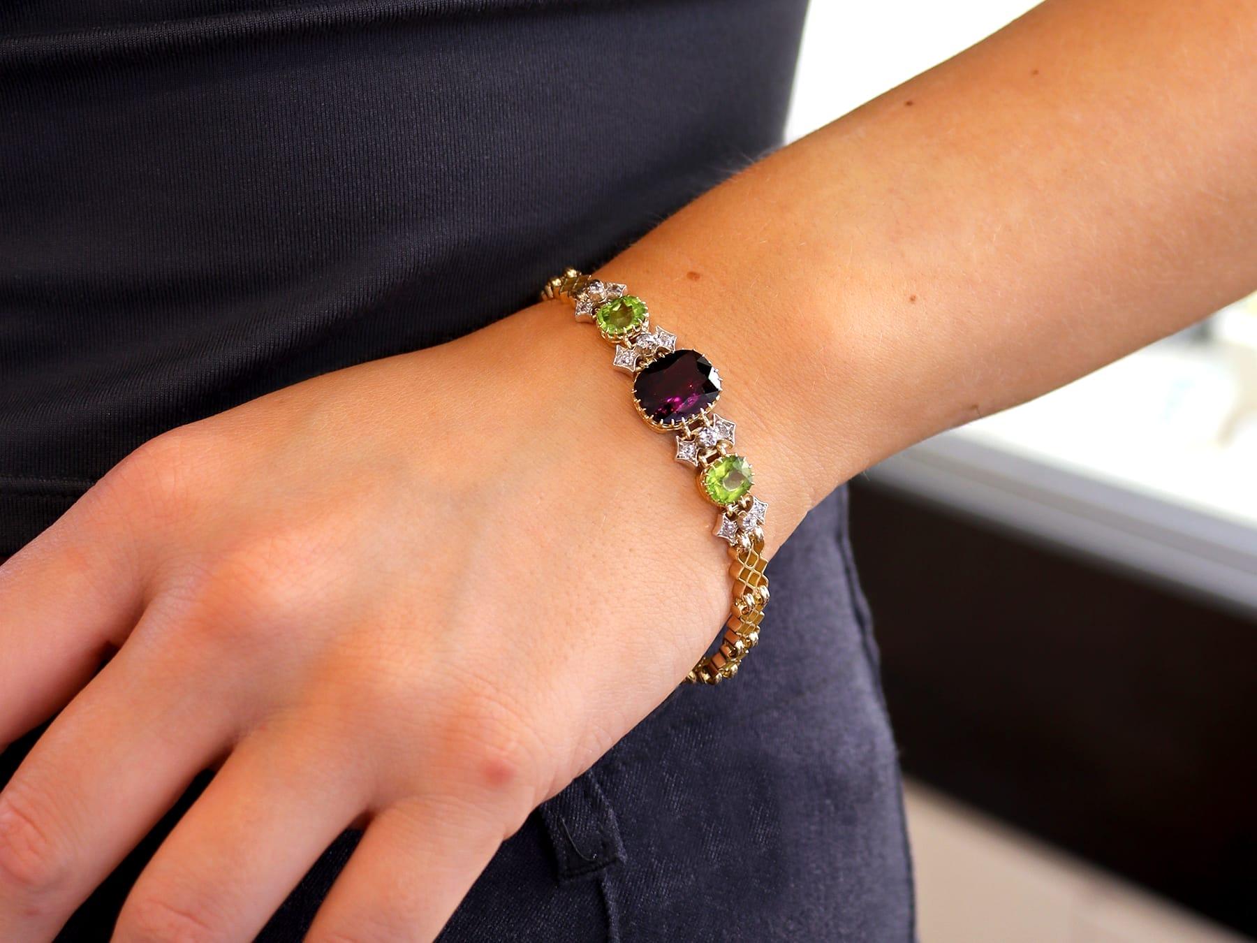 Cushion Cut Antique Garnet, Peridot and Diamond, 15 Karat Yellow Gold Bracelet Circa 1910 For Sale