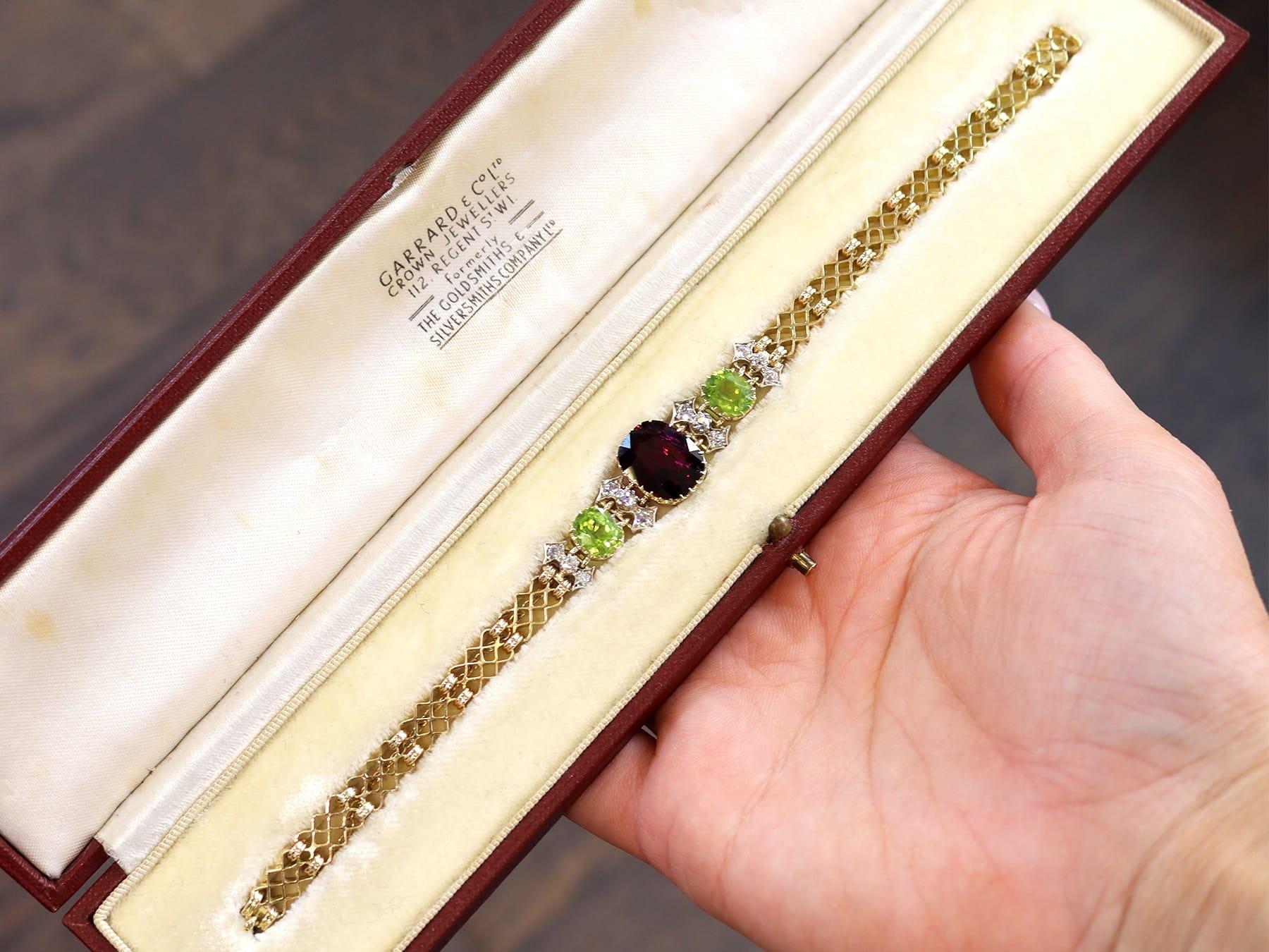 Women's or Men's Antique Garnet, Peridot and Diamond, 15 Karat Yellow Gold Bracelet Circa 1910 For Sale