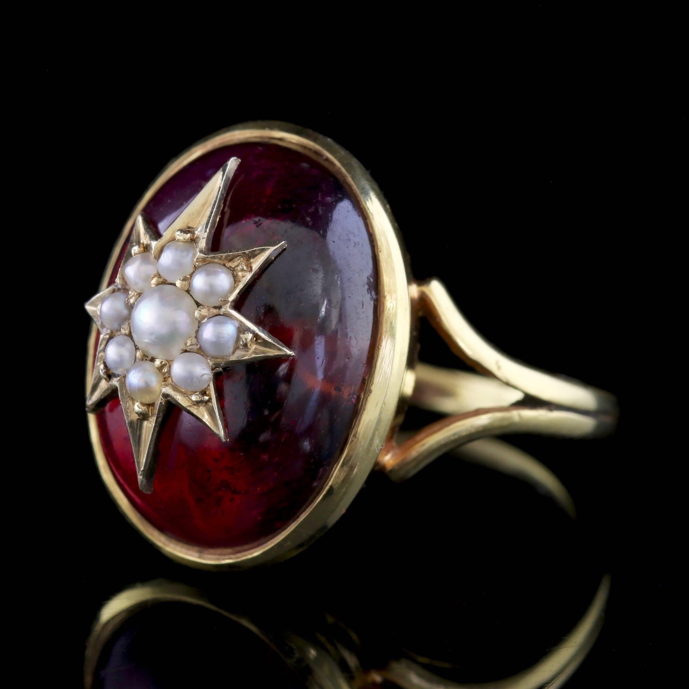 To read more please click continue reading below-

This fabulous antique 18ct Yellow Gold Garnet ring is Victorian Circa 1880. 

The ring boasts a large cabochon Almandine Garnet which is crowned with a Pearl encrusted star.

Almandine Garnet’s are