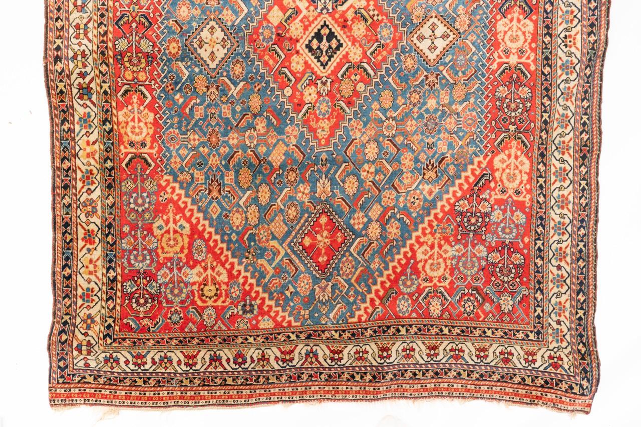 This finely detailed Qashgai, over 100 years old is unusual as to its length as well as its elegance, achieved within the pattern language typical of this celebrated Persian tribe. Excellent condition.