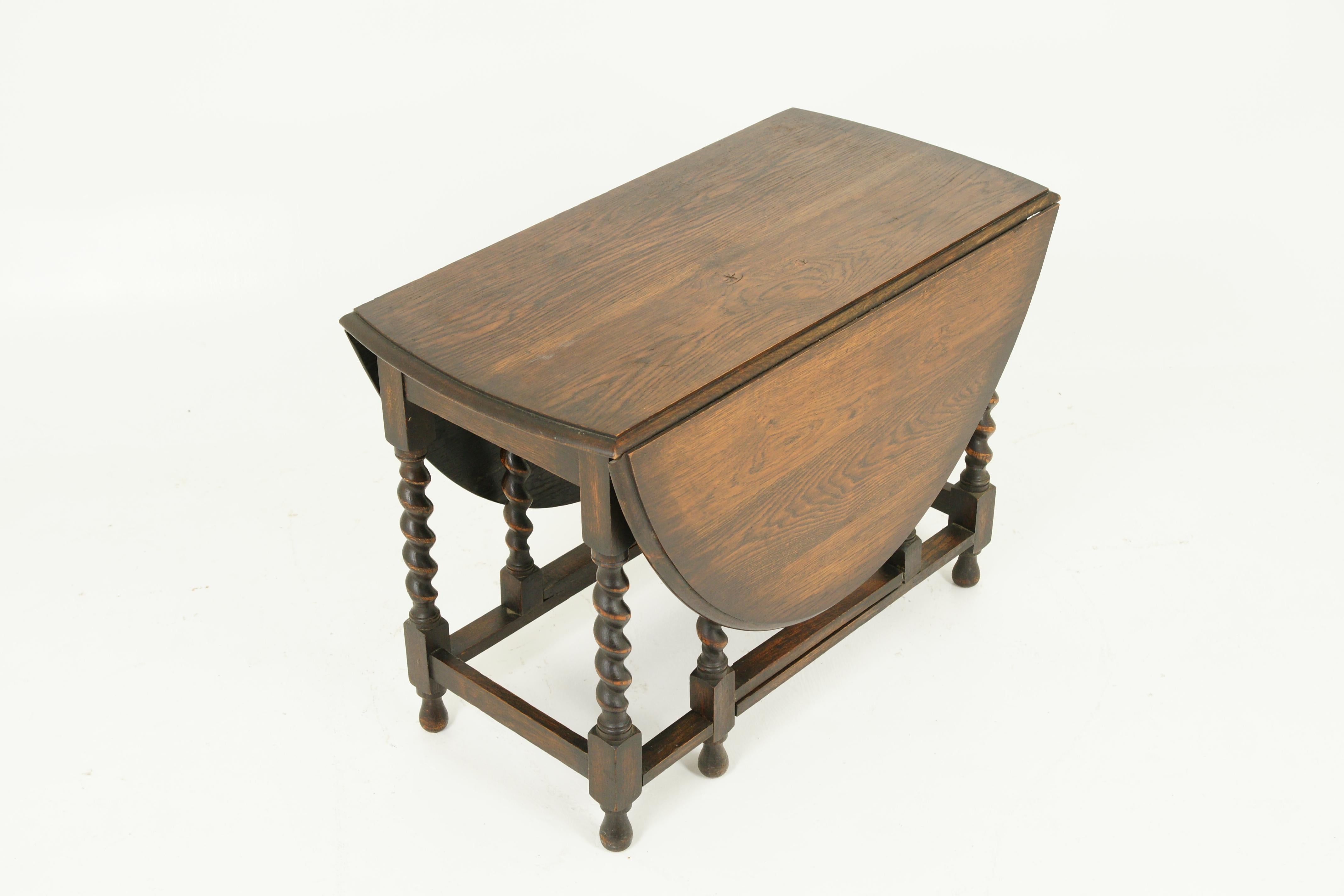 Antique Gateleg table, barley twist, drop leaf, Scotland 1920, Antique Furniture, B1387 

Scotland 1920
Solid oak, original finish
Good solid top
Pair of oval leaves that extend the table
Standing on thick barley twist legs
All connected by