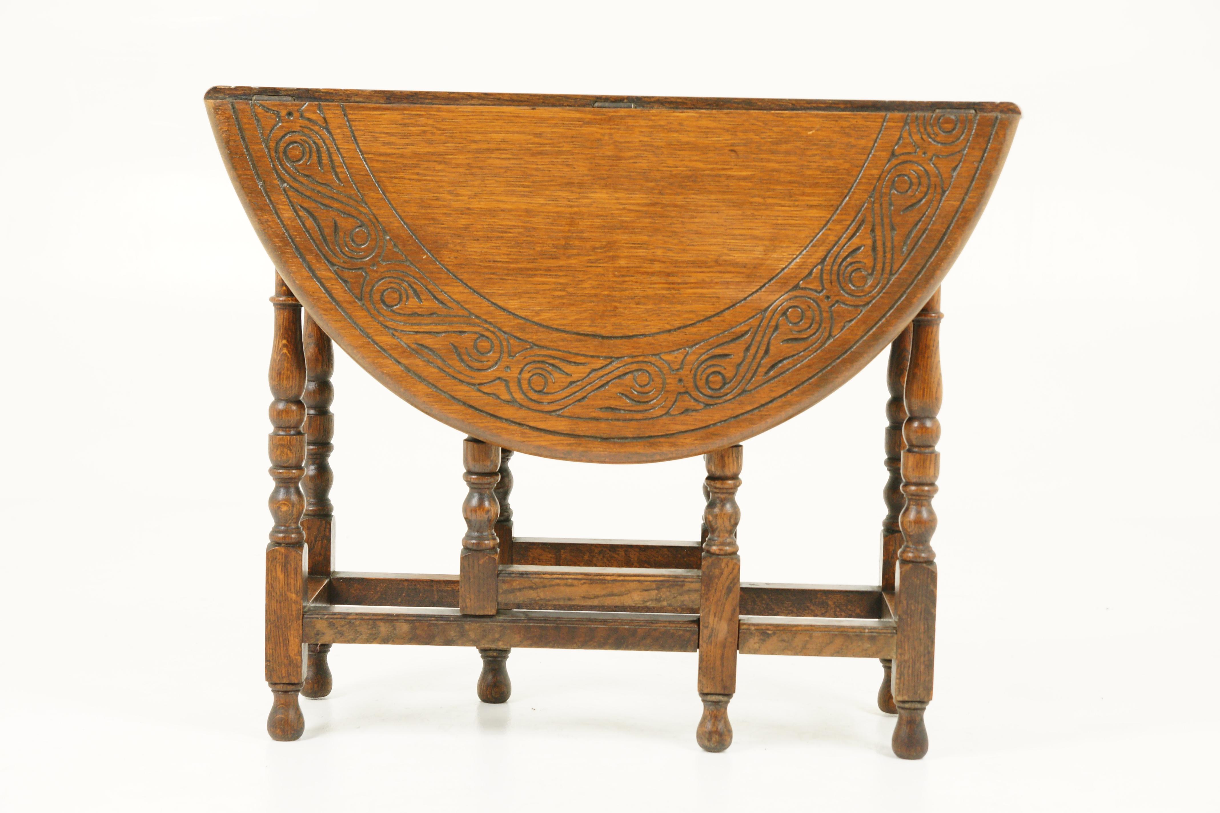 Antique gateleg table, carved drop leaf table, antique furniture, Scotland 1930, B1717

Scotland, 1930
Solid oak construction
original finish
rectangular top when closed
carved edge around the top and the two leaves
pair of leaves open to the sides