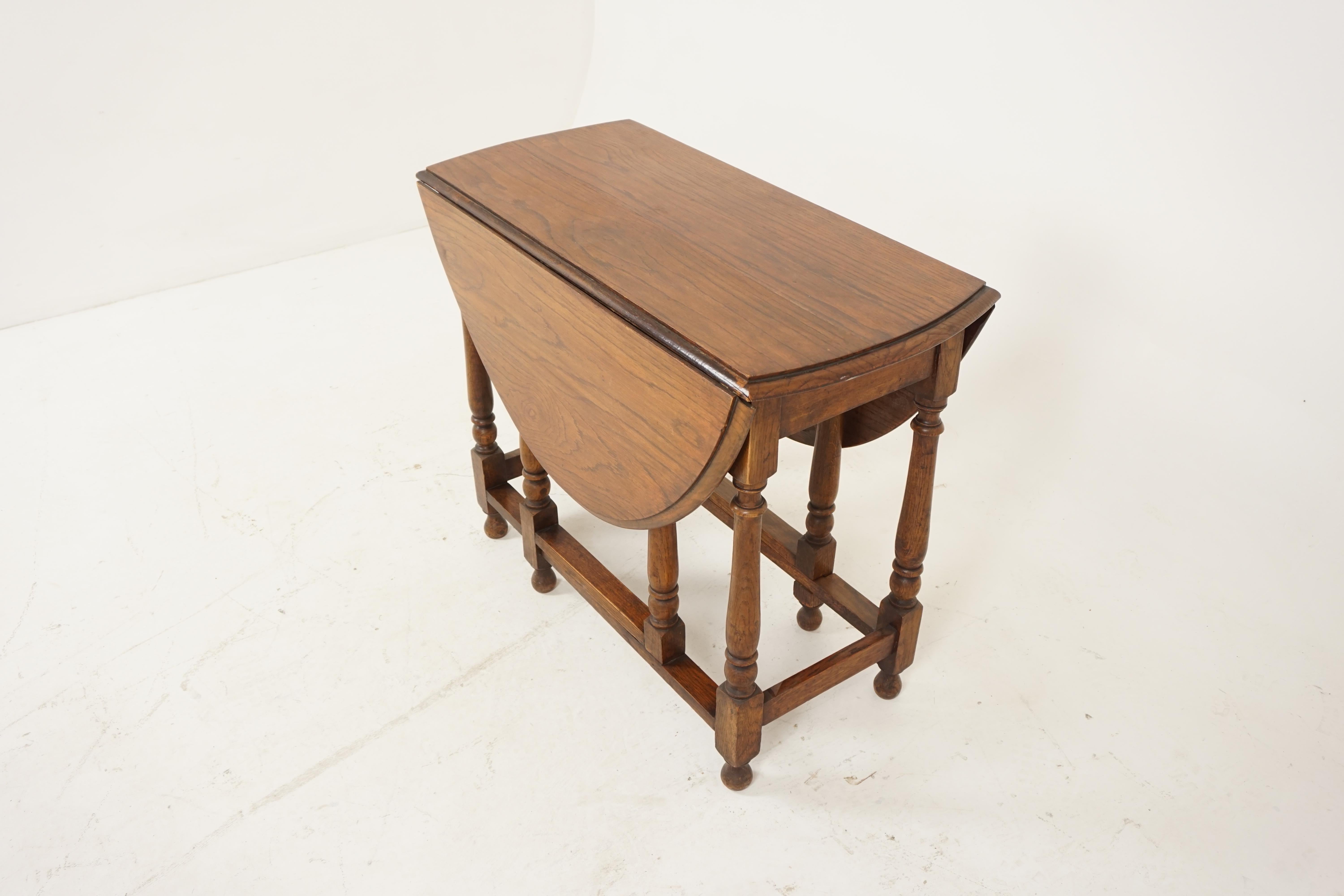 Antique gateleg table, oak, oval drop leaf table, Scotland 1920, B2081

Scotland 1920
Solid oak construction
Original finish
Moulded rectangular top
Two oval drop leaves to the sides
Ending on thick turned legs
Connected by cross