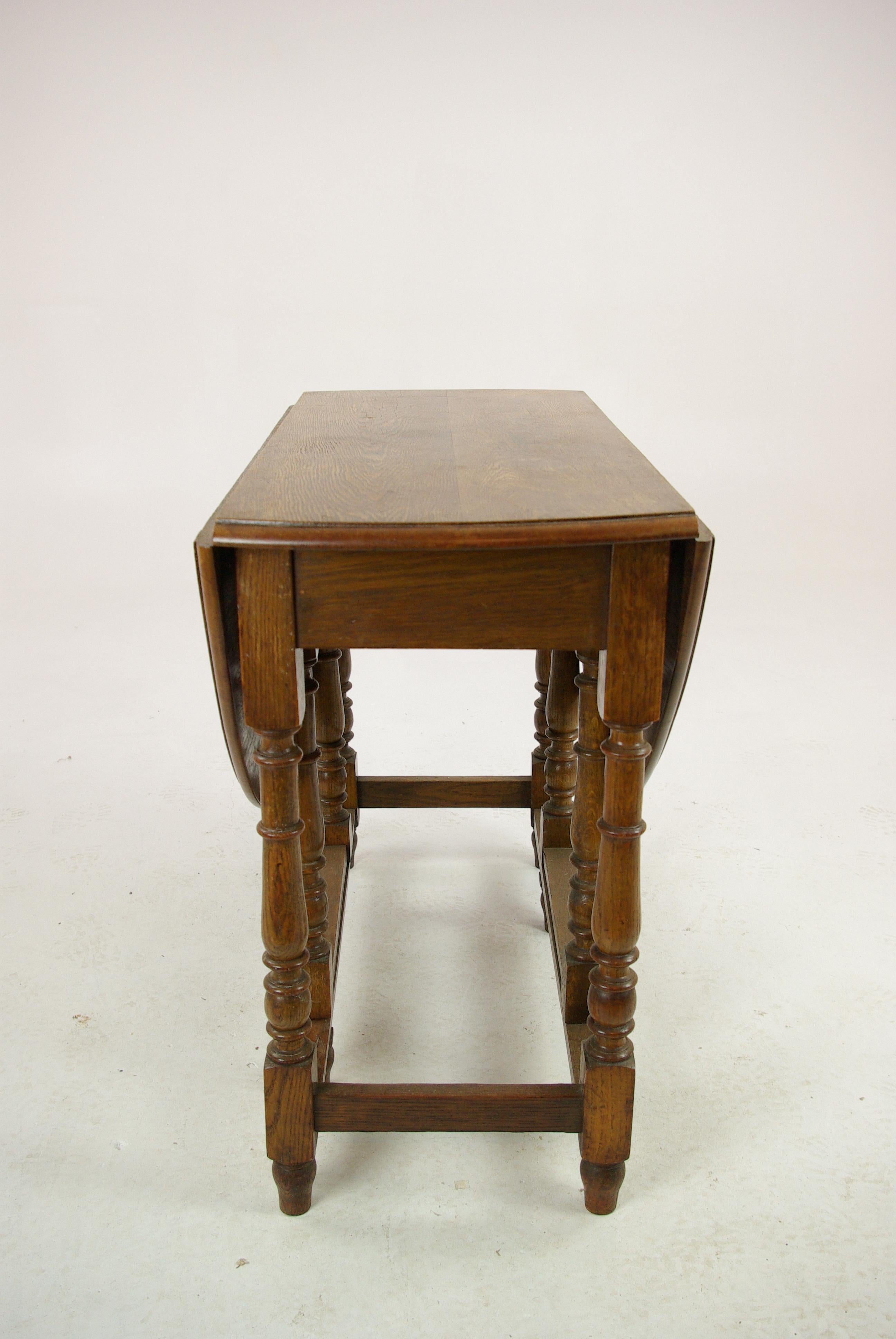 Antique gateleg table, oak oval drop leaf table, Scotland 1920s, antique furniture, B1419

Scotland, 1920s
Solid oak construction
Original finish
Two oval drop leaves to the side
Ending on thick turned legs
Joined by cross stitches
Very clean and in