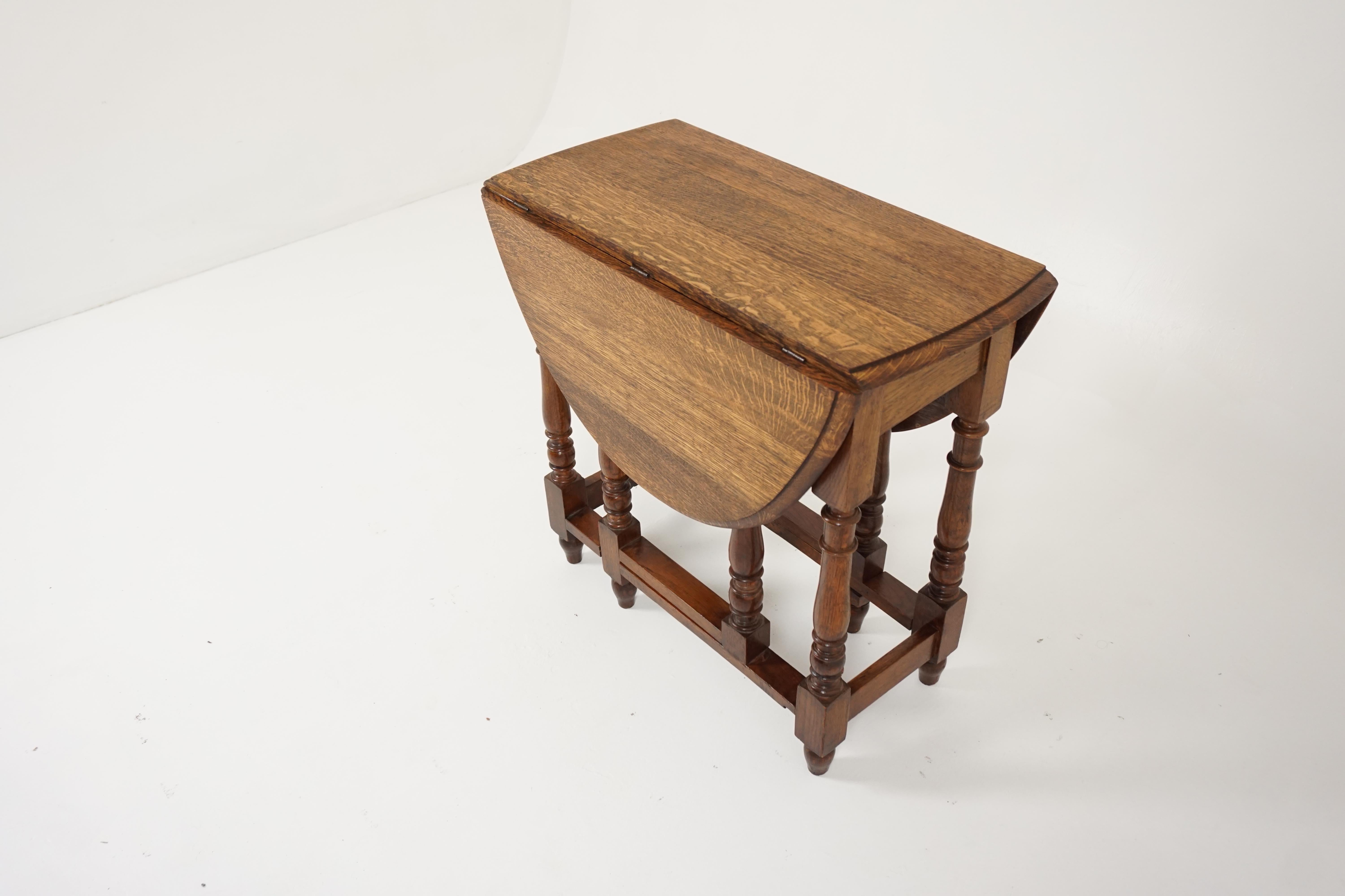 Antique gateleg table, tiger oak drop-leaf table, antique furniture, Scotland, 1910

Scotland, 1910
Solid oak
Original finish
Rectangular top
Pair of drop leaves to the side
Standing on turned supports
Joined by stretchers 
Very clean and
