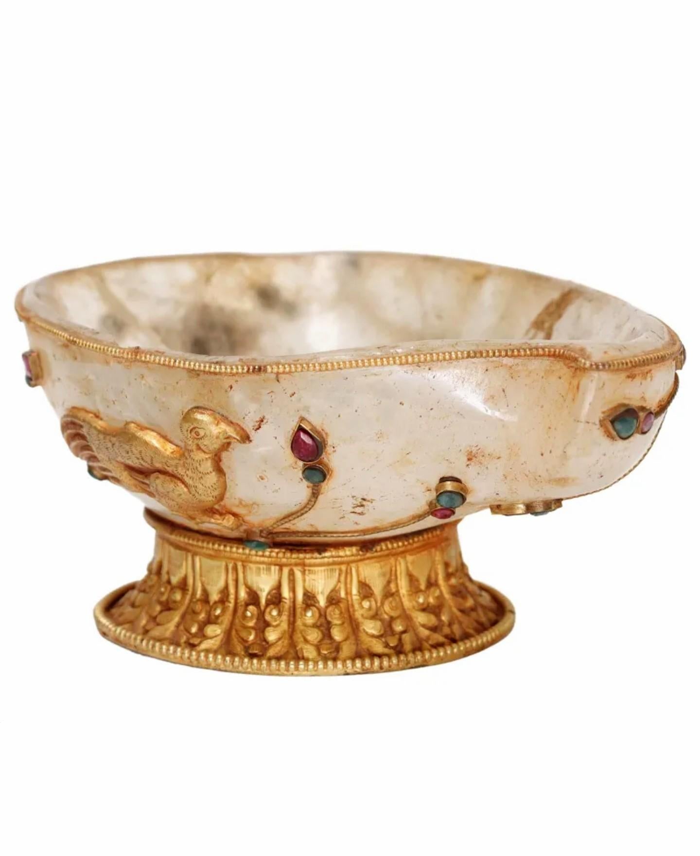 A spectacular Mughal Empire Period (1526-1857) precious gemstone set gilt bronze ormolu mounted carved rock crystal vessel Buddhist altar offering bowl.

Exquisitely handmade, South Asian antique, likely Nepal / Himalayan / Tibetan Plateau region,