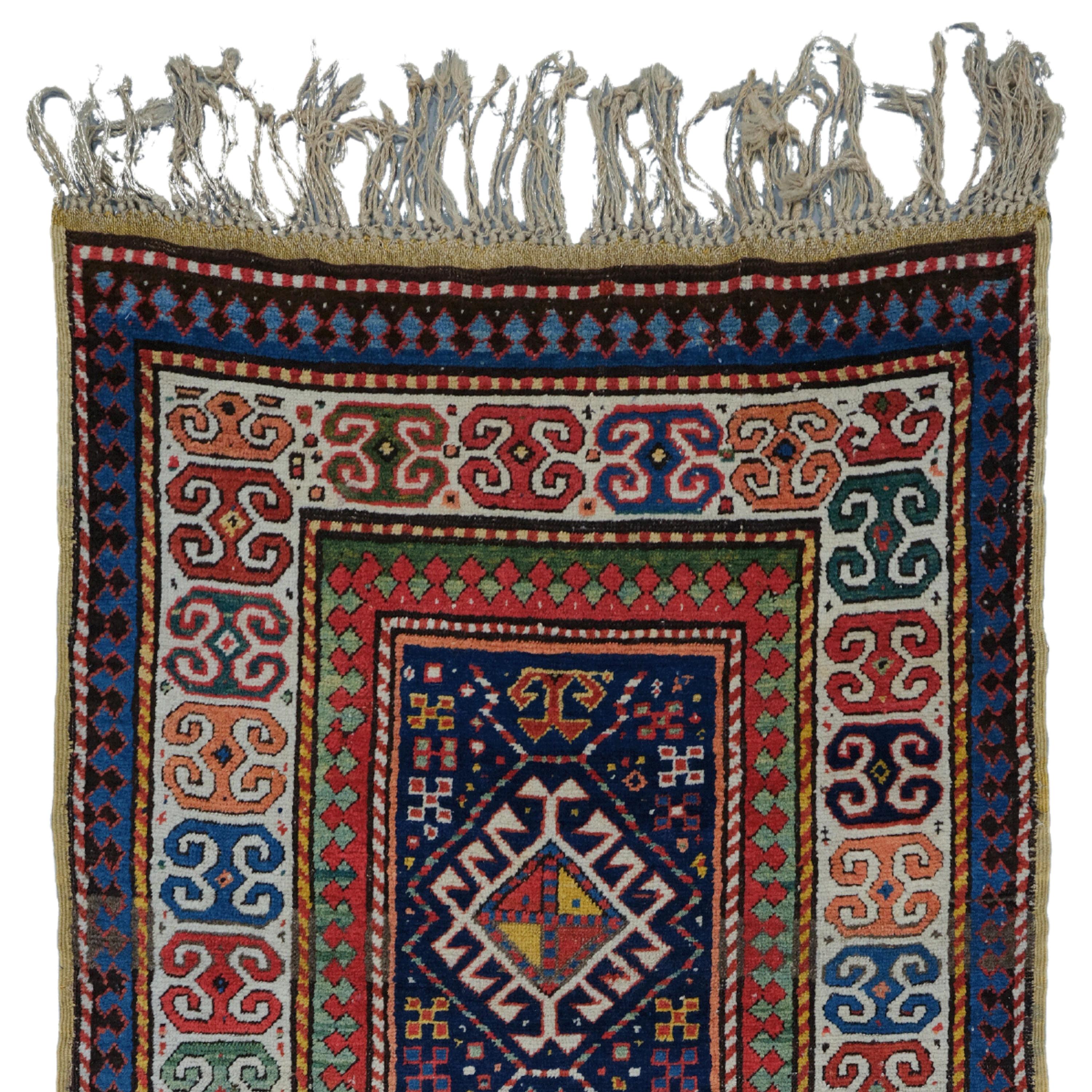 19th Century Caucasian Gendje Runner

This elegant antique silk Kayseri carpet brings the elegance and craftsmanship of the 19th century to the present day. This work, which draws attention with its rich color palette and detailed patterns, adds