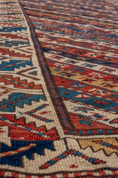 Antique Genje Rug diagonal tribal stripe pattern