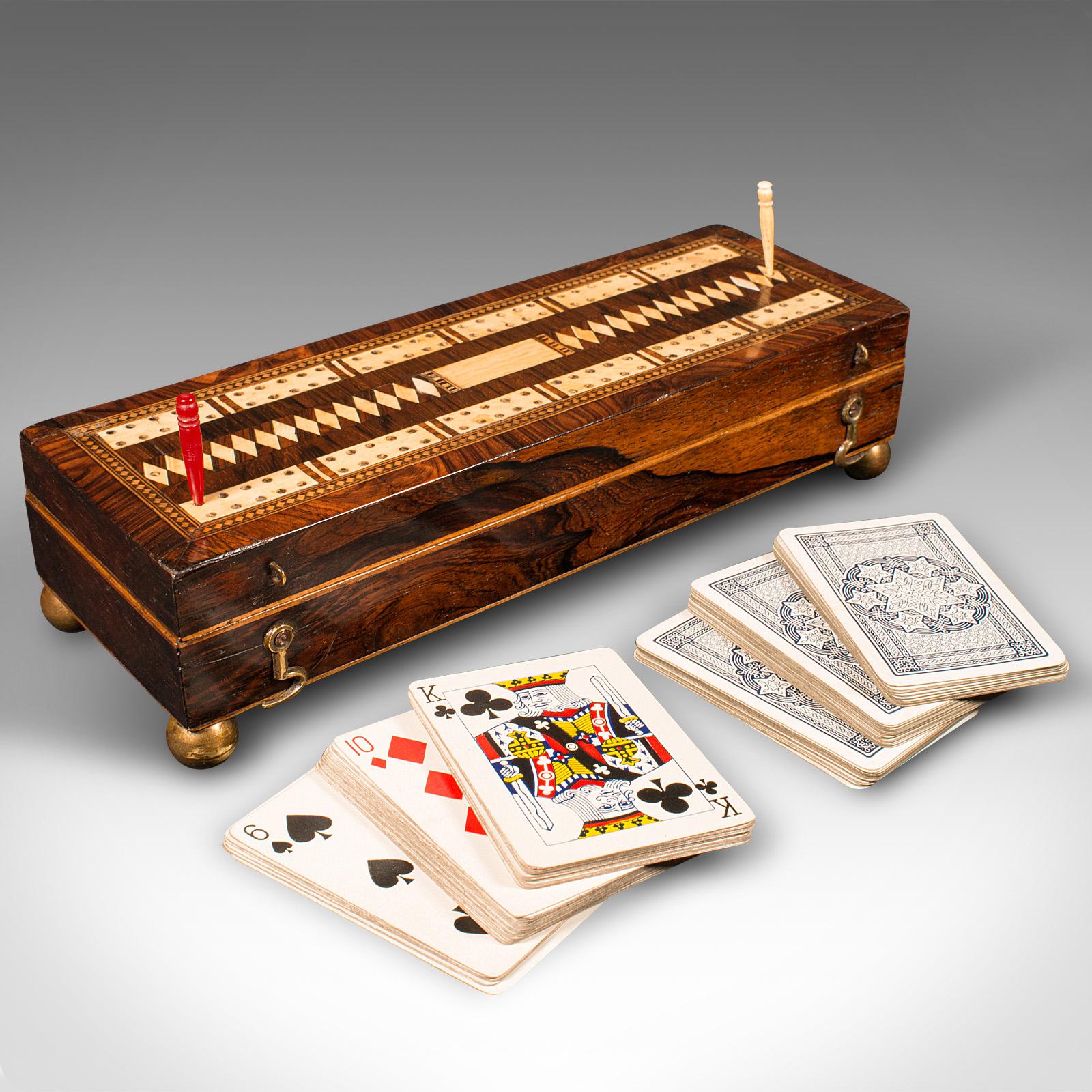 This is an antique gentleman's cribbage case. An English, rosewood and brass card game box, dating to the Victorian period, circa 1880.

Beautifully presented case for spontaneous hands of cribbage
Displays a desirable aged patina and in good