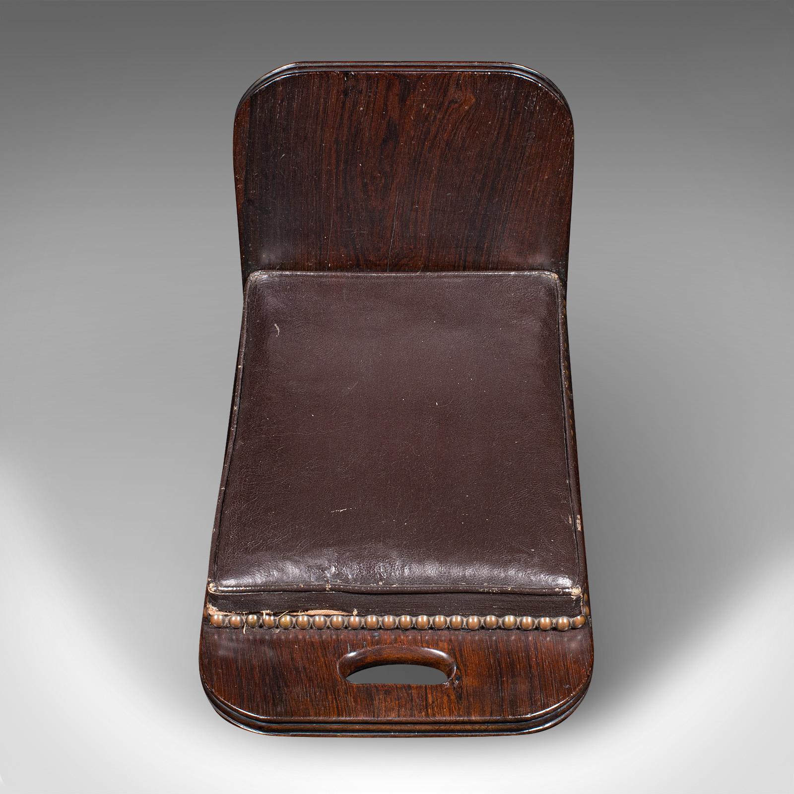 
This is an antique gentleman's gout stool. An English, solid rosewood and leather occasional foot rest, dating to the Georgian period, circa 1800.

Fine country house example, with deep stocks and appealing form
Displays a desirable aged patina and