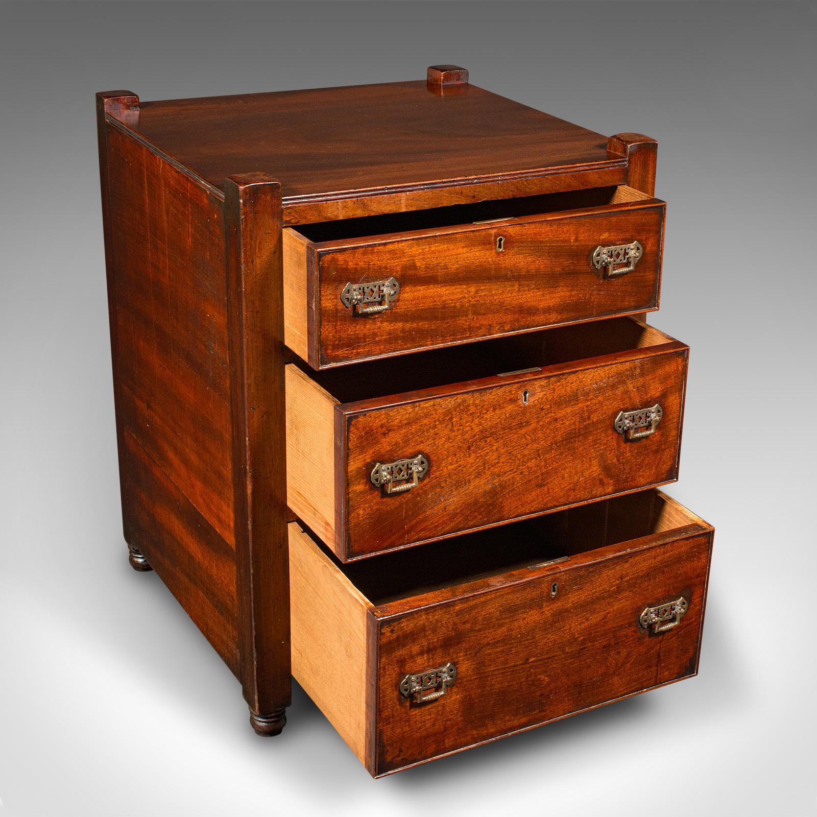 This is an antique gentleman's nightstand. An English, mahogany bedside chest of drawers, dating to the Georgian period and later, circa 1780.

Appealingly figured bedroom nightstand with useful proportion
Displays a desirable aged patina and in