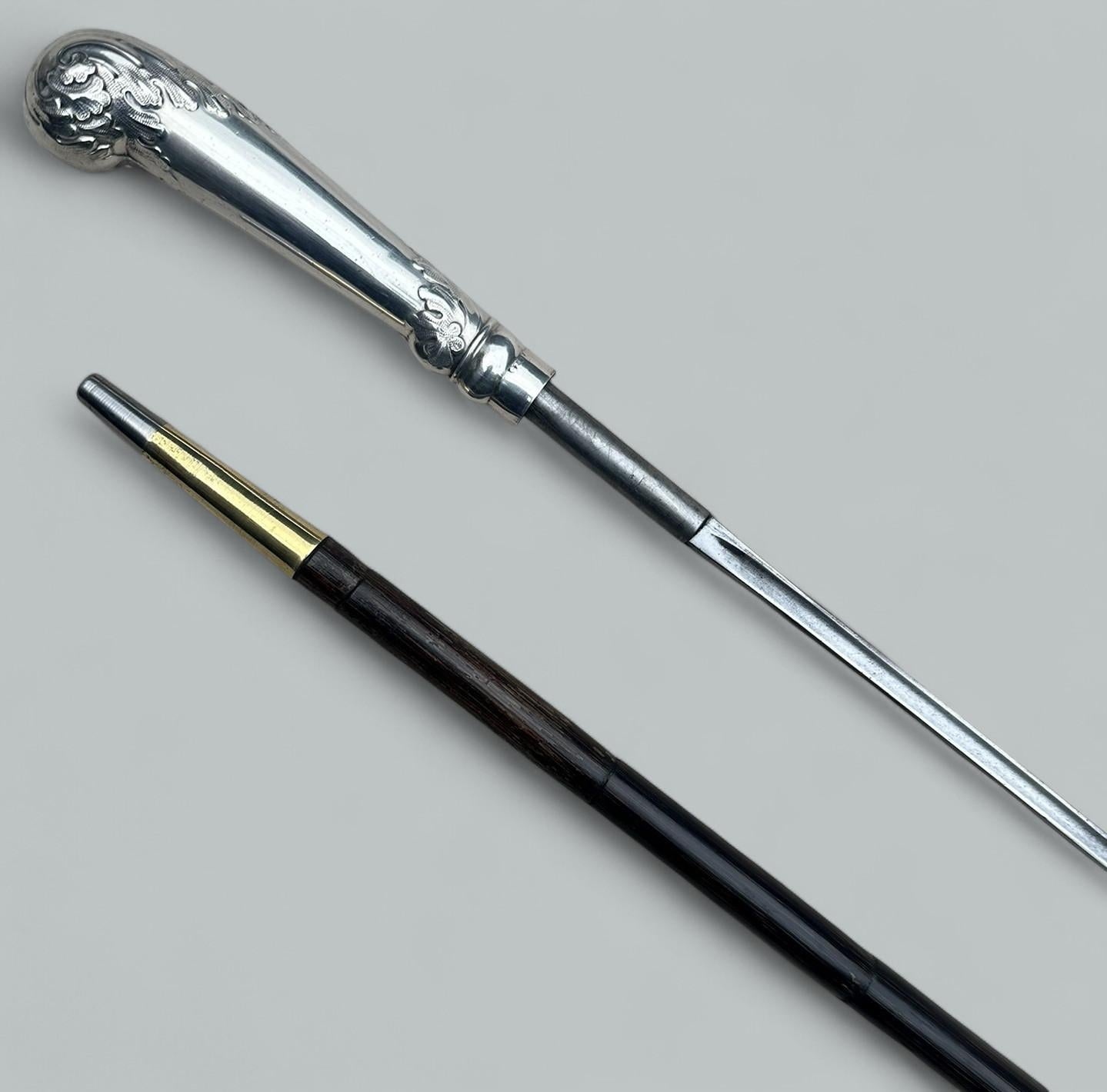 Superb Rare Polished Well Figured banded Partridge wood Sword Stick of outstanding quality, enclosing its original three-sided tapering polished steel blade, late Nineteenth Century, of English or possibly Asian origin.  

The highly ornate silver