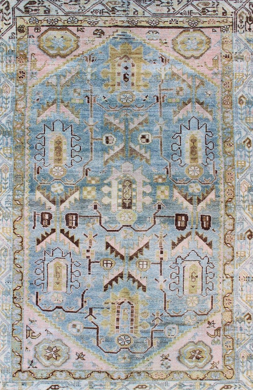 light blue geometric rug