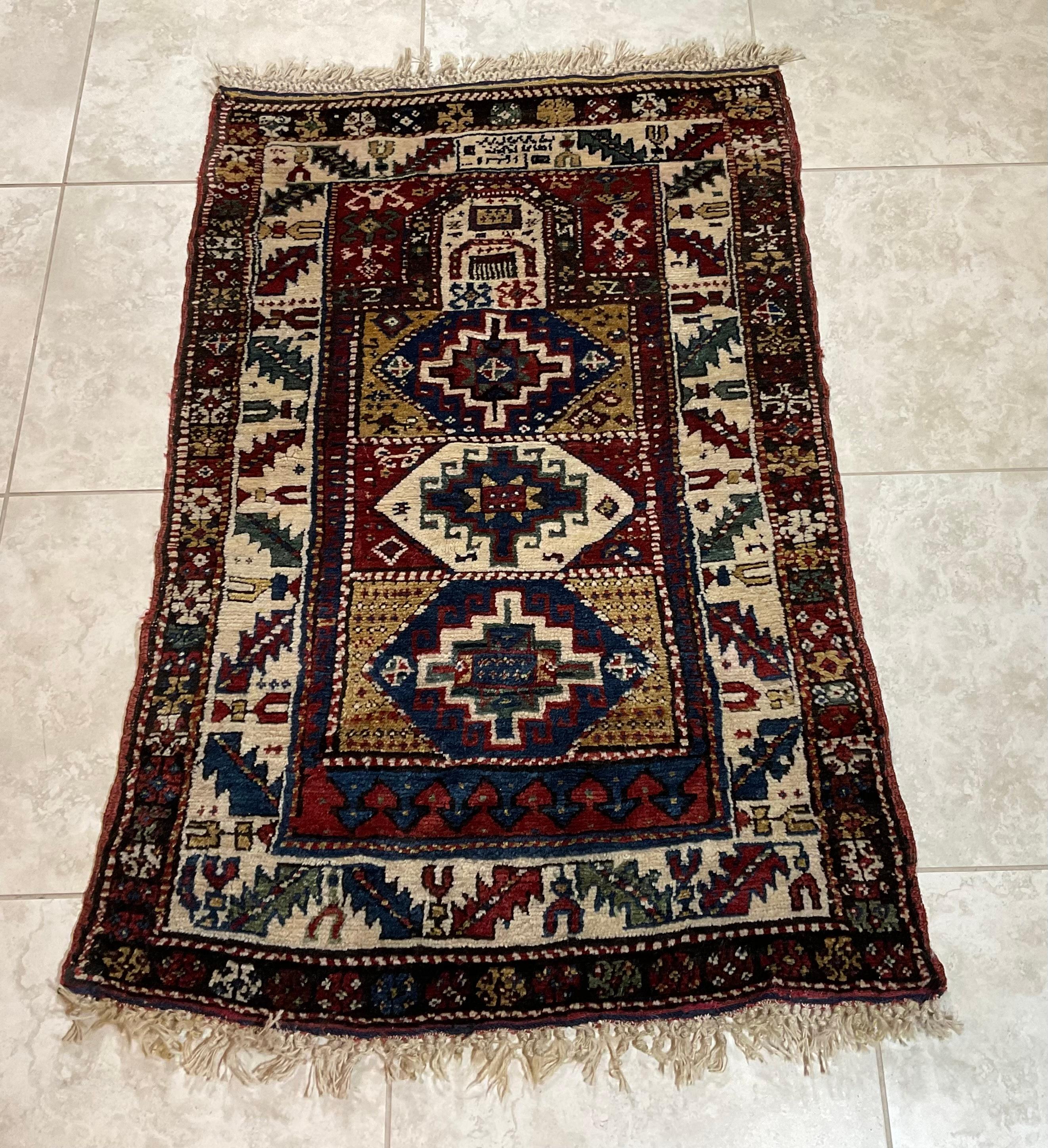 Elegant tribal Caucasian Kazak rug made of fine wool with beautifully executed geometric motifs ,three medallions surrounded by intricate Borders. The rug handwoven by nomadic family . Full pile and original fringes, very strong foundation soft