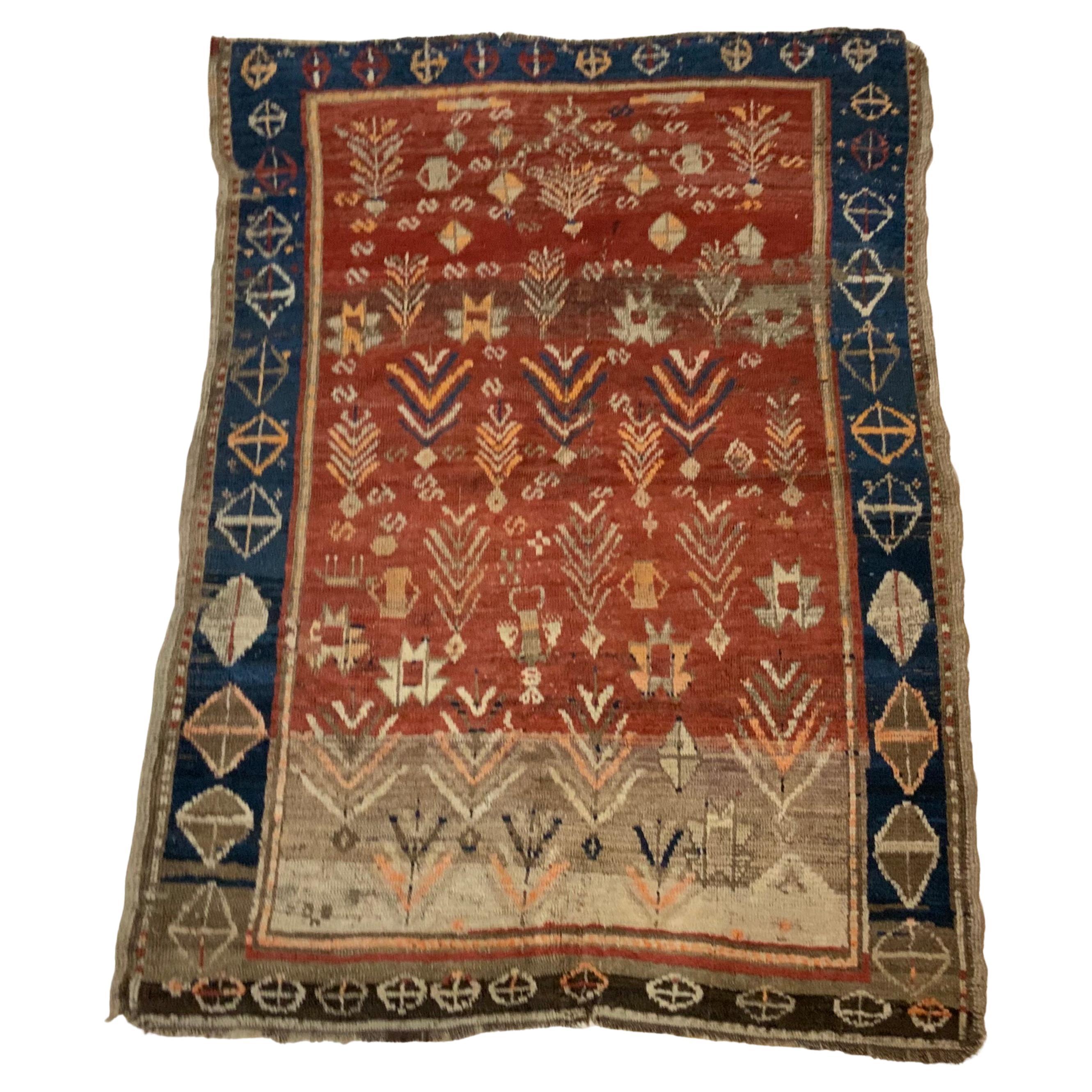 Antiker kaukasischer Teppich mit geometrischen Motiven, Stammeskunst