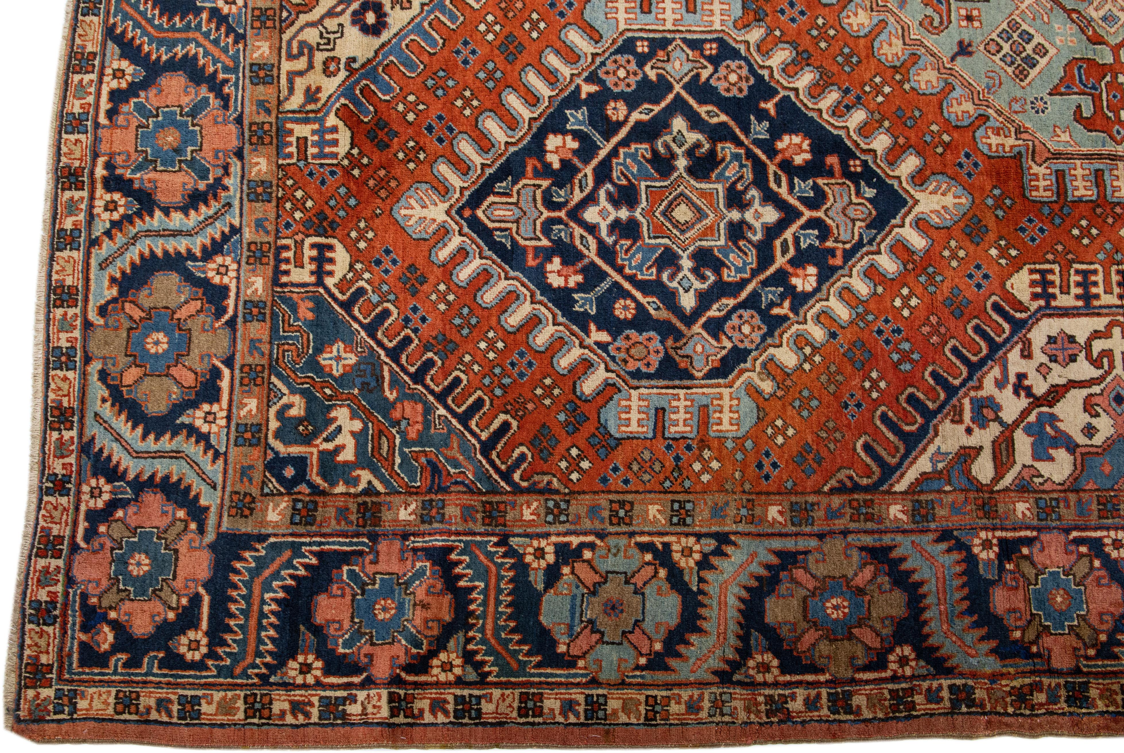 Heriz Serapi  Antique Geometric Persian Heriz Handmade Wool Rug with Orange Rust Field For Sale