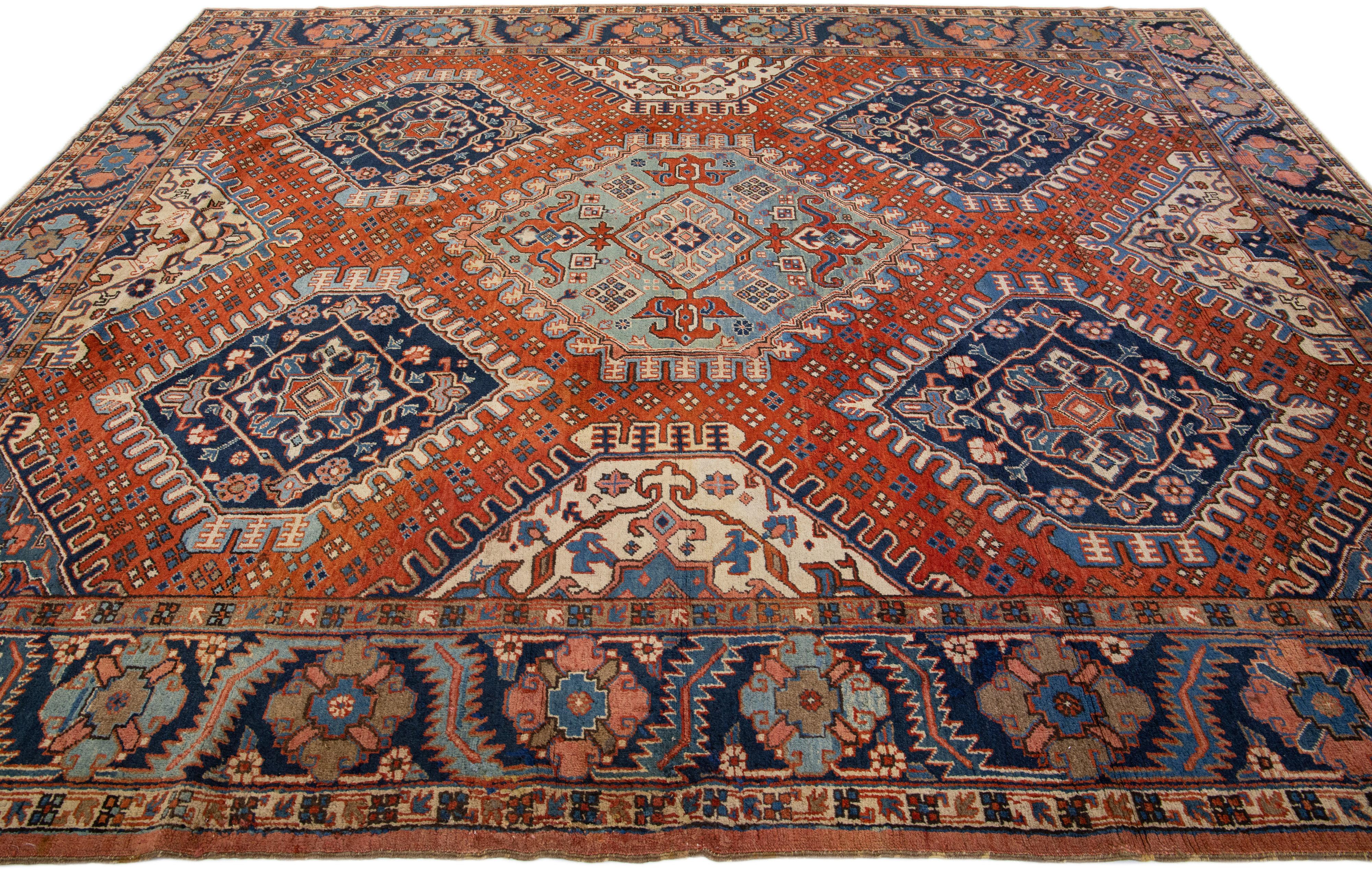  Antique Geometric Persian Heriz Handmade Wool Rug with Orange Rust Field In Good Condition For Sale In Norwalk, CT