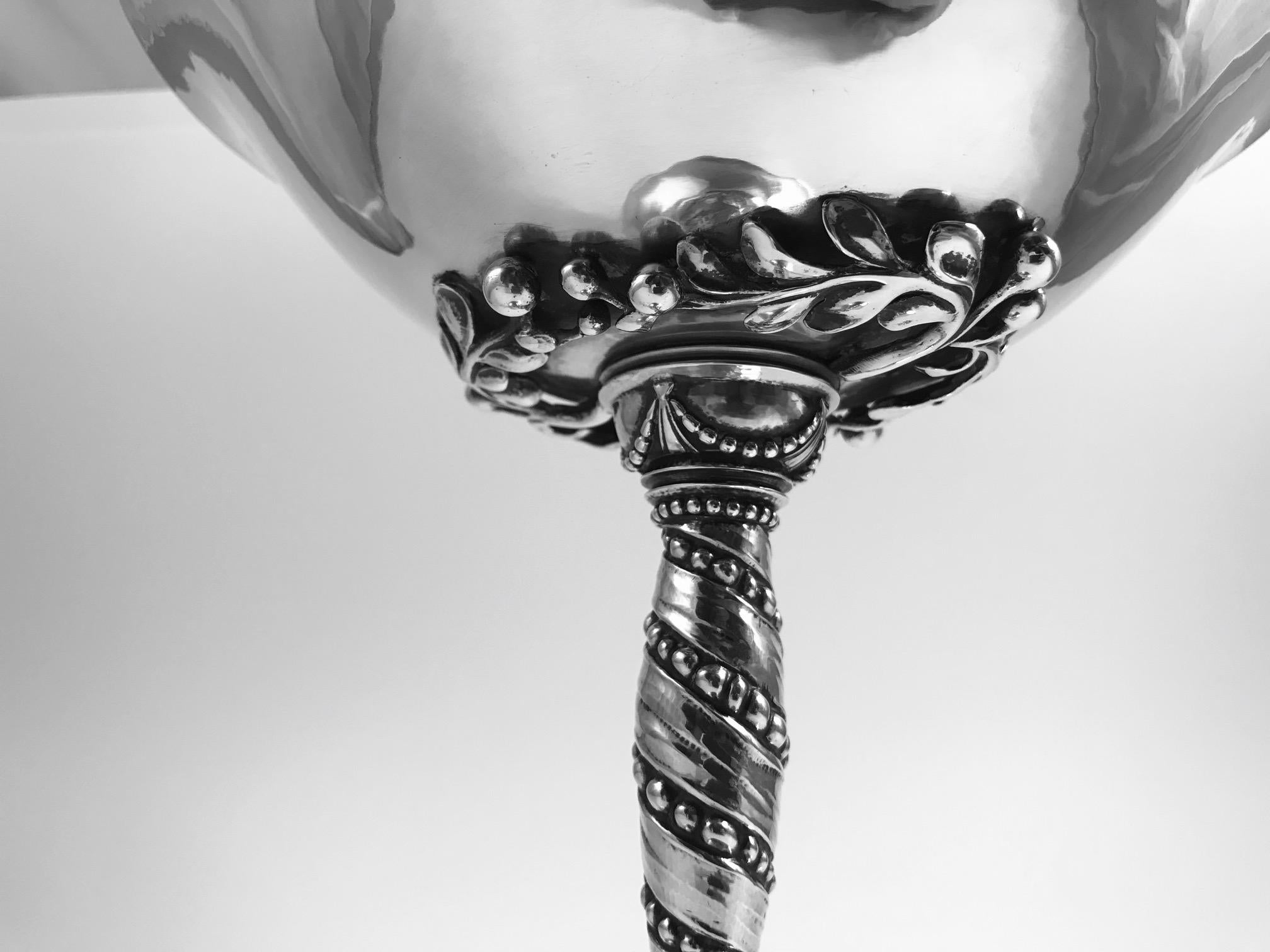 This is an antique 830 silver Georg Jensen compote with spiralled stem and elaborate leafy decoration under the bowl, design #178 by Johan Rohde from circa 1915. To find a piece like this with fabrication date one year after the design date is