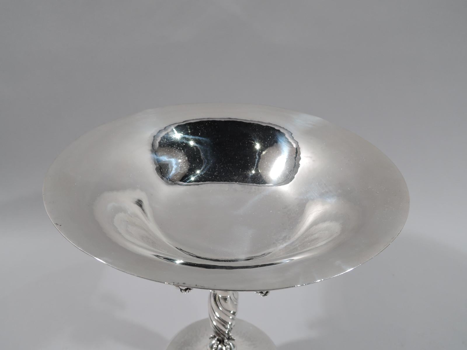Beautiful sterling silver grape compote. Made by Georg Jensen in Copenhagen. Bowl has curved sides and wide mouth. Applied to bowl underside is fruiting grapevine with pendant bunches. Twisted support with lobes and beads. Raised circular foot. Bowl