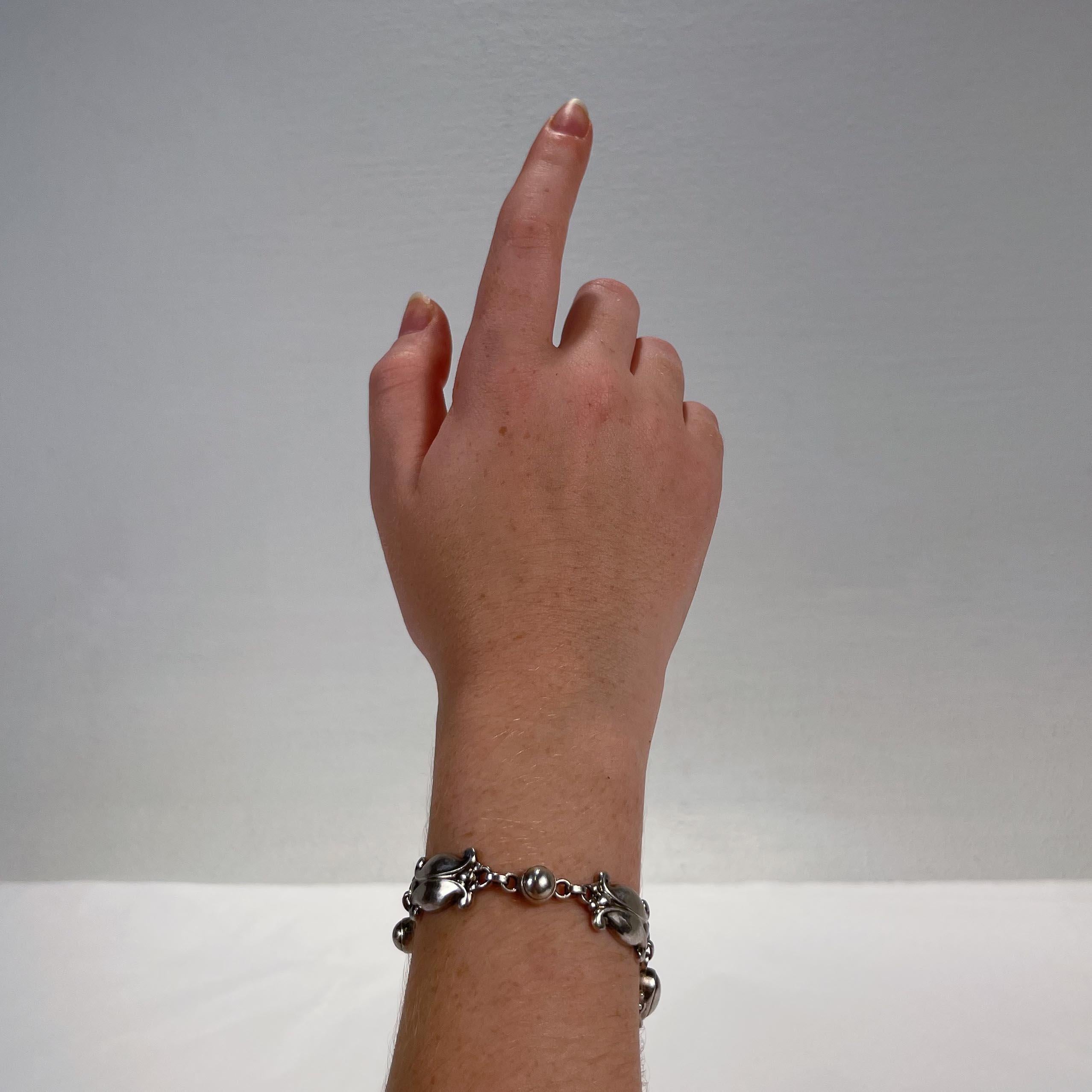 A fine antique sterling silver bracelet.

Model no. 11

Designed by Georg Jensen.

Simply a wonderful brooch from one of Denmark's premier silversmiths!

Date:
20th Century, post-1945

Overall Condition:
It is in overall good, as-pictured, used