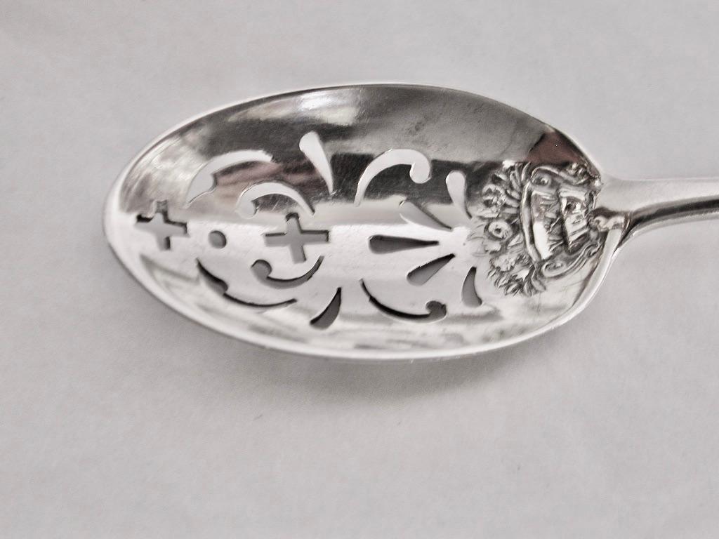 Antique George 111 Mote Spoon Dated Circa 1760 London Assay William Lilley 
Mote spoons were used for skimming dust motes from the surface of a cup of tea (a common problem for tea drinkers at a time when the product was carried in wooden chests)