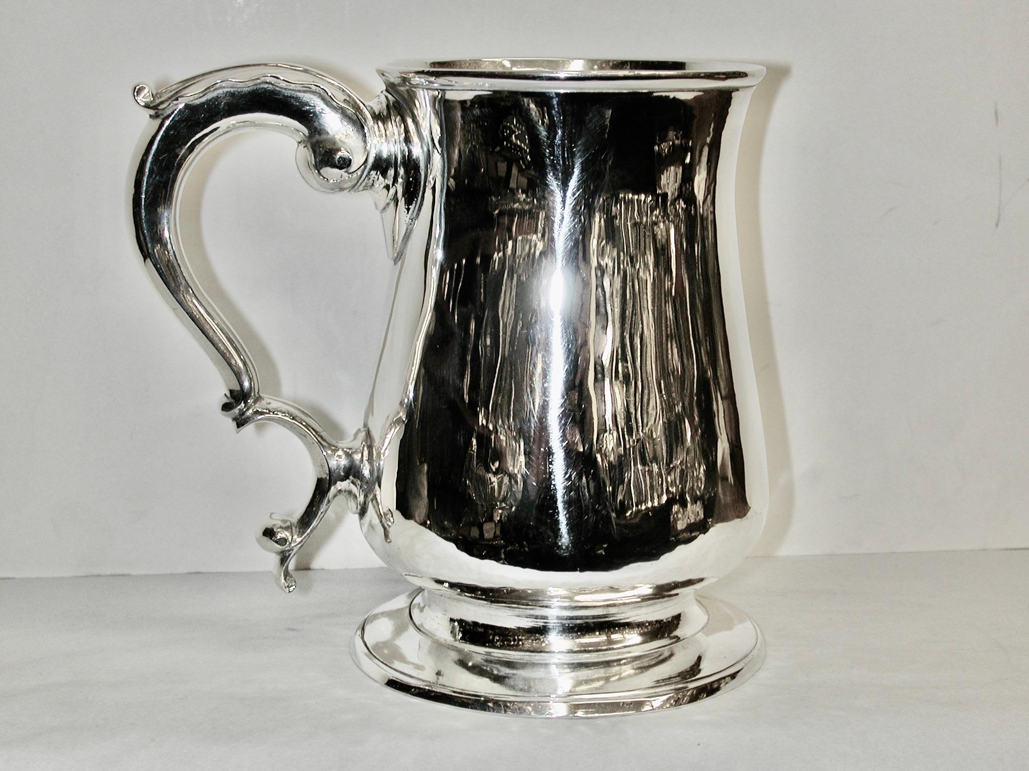 Antique George 111 Silver Quart Tankard Dated 1779 Jasper Kelly London
Heavy quality bellied tankard, weighing 21.5 troy ounces
