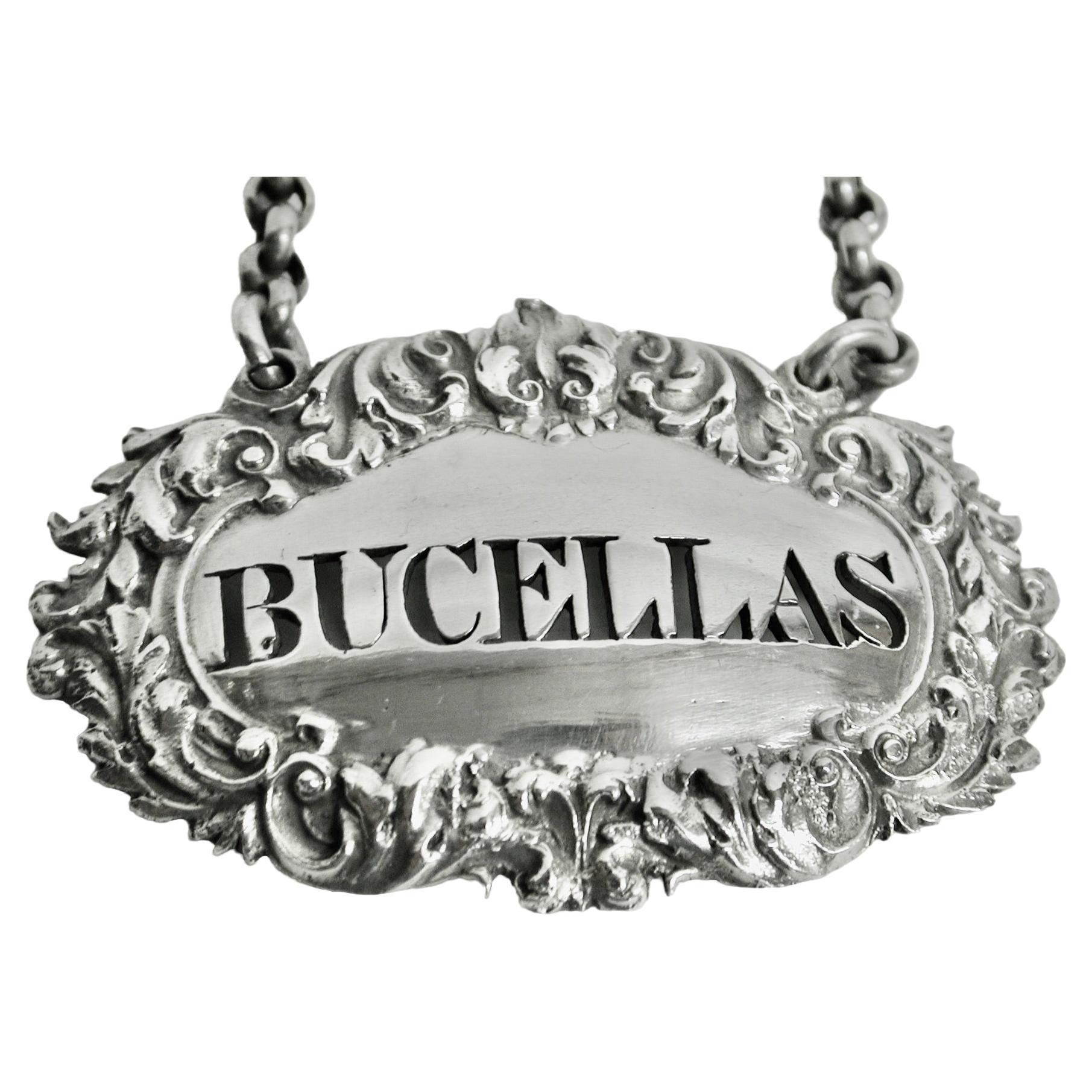 Antique George 1V Silver Bucellas Wine Label Dated 1828 London Charles Rawlings
A  heavy beautifully cast wine label with hand pierced bucellas.
This maker specialised in making fine quality wine labels
Bucellas is a white wine from a village near