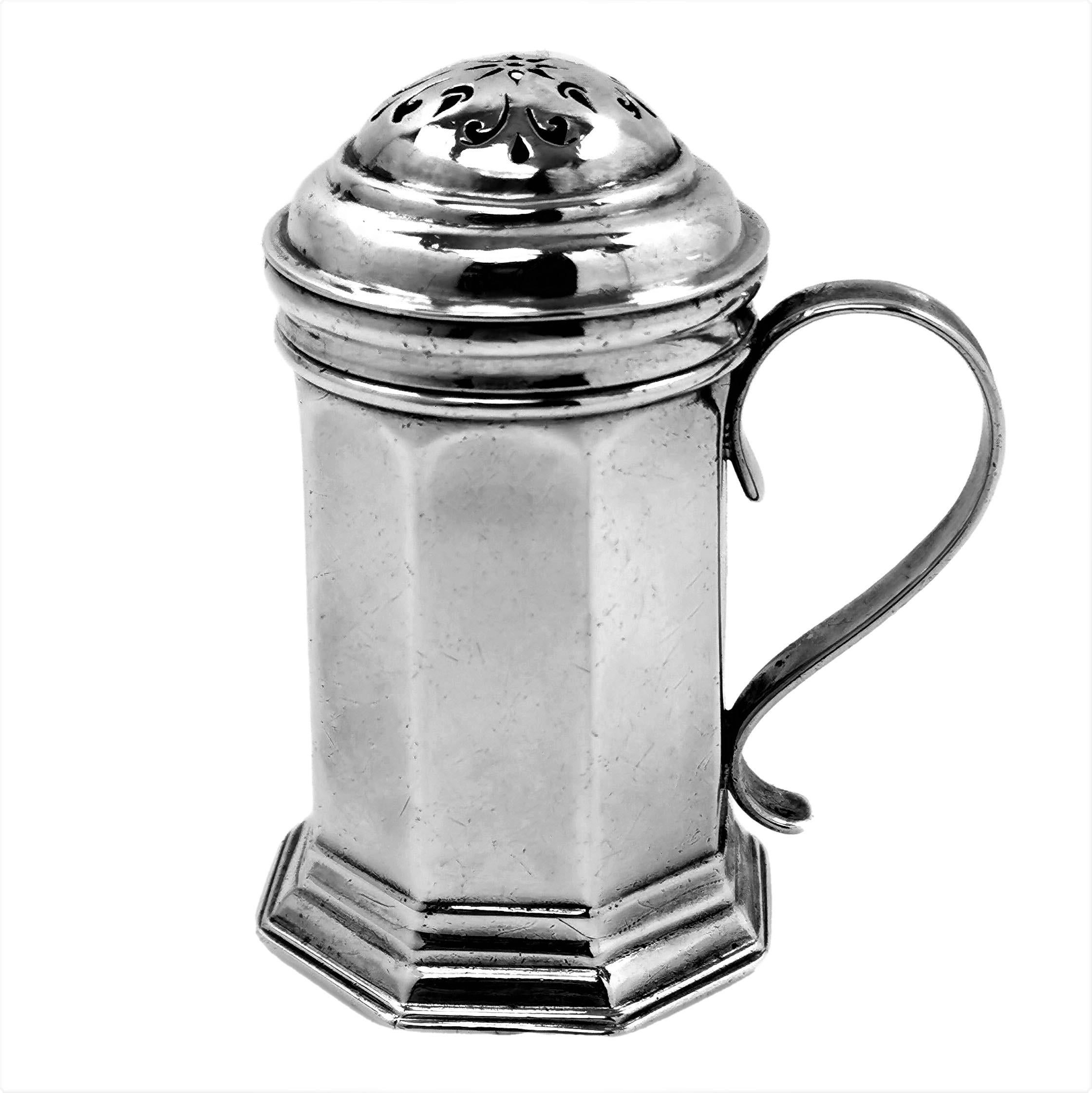 A small Antique early Georgian solid Silver Shaker /  Caster with an octagonal body and a domed push fit lid.

Made in England in 1722 by James Goodwin.

Approx. Weight - 82g
Approx. Height - 7.5cm
Approx. Width of base - 4.3cm

The George I shaker