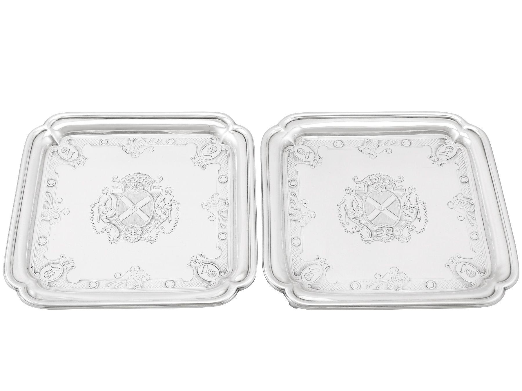 An exceptional, fine and impressive pair of antique Georgian English Britannia silver salvers made by Paul de Lamerie; an addition to our tray and salver collection.

These exceptional antique George II Britannia standard silver salvers have a