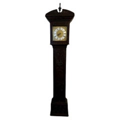 Antique George II quality carved oak brass face long case clock