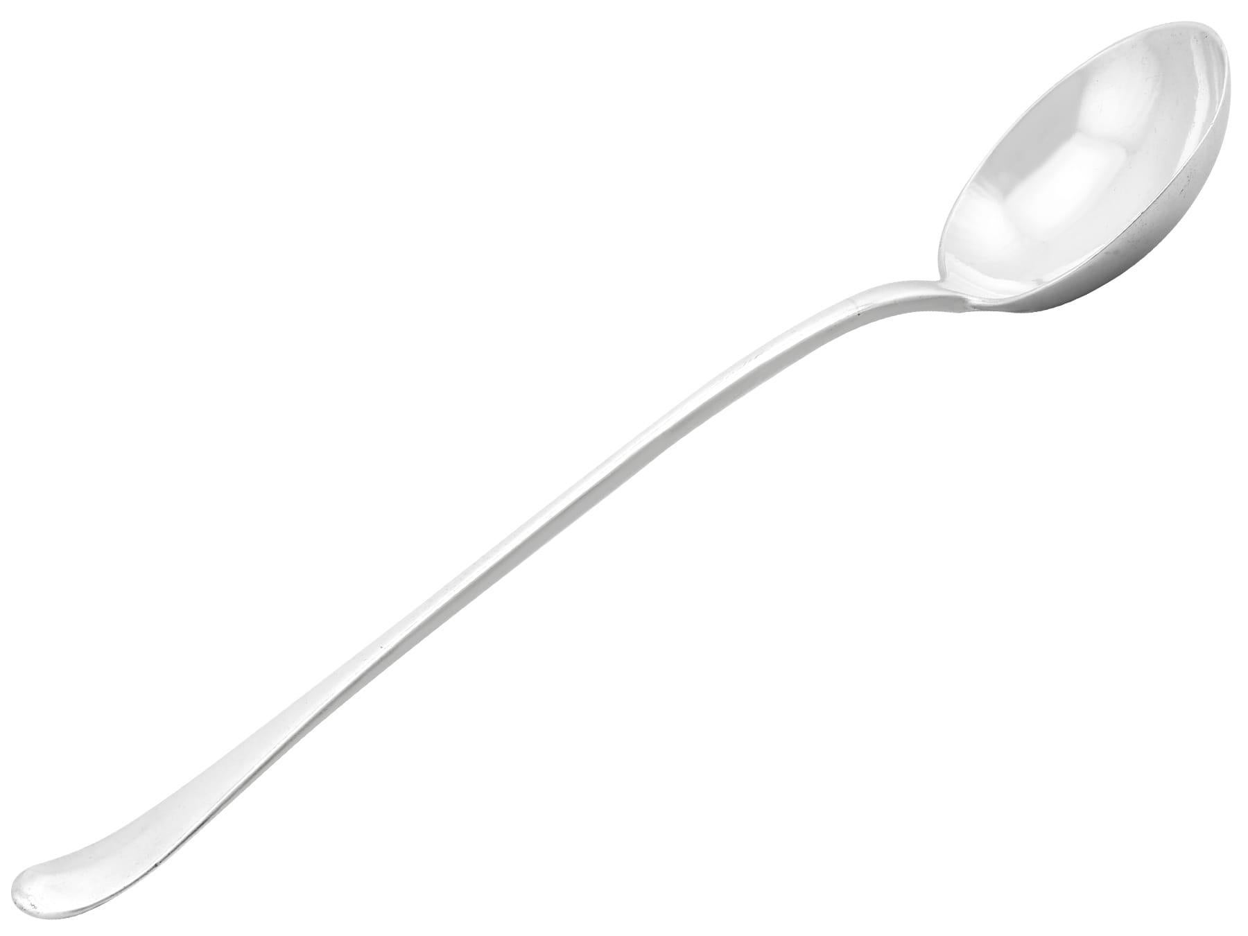 An exceptional, fine and impressive antique George II English sterling silver Hanoverian pattern soup ladle; an addition to our Georgian silverware collection.

This exceptional and rare antique sterling silver soup ladle has been crafted in the