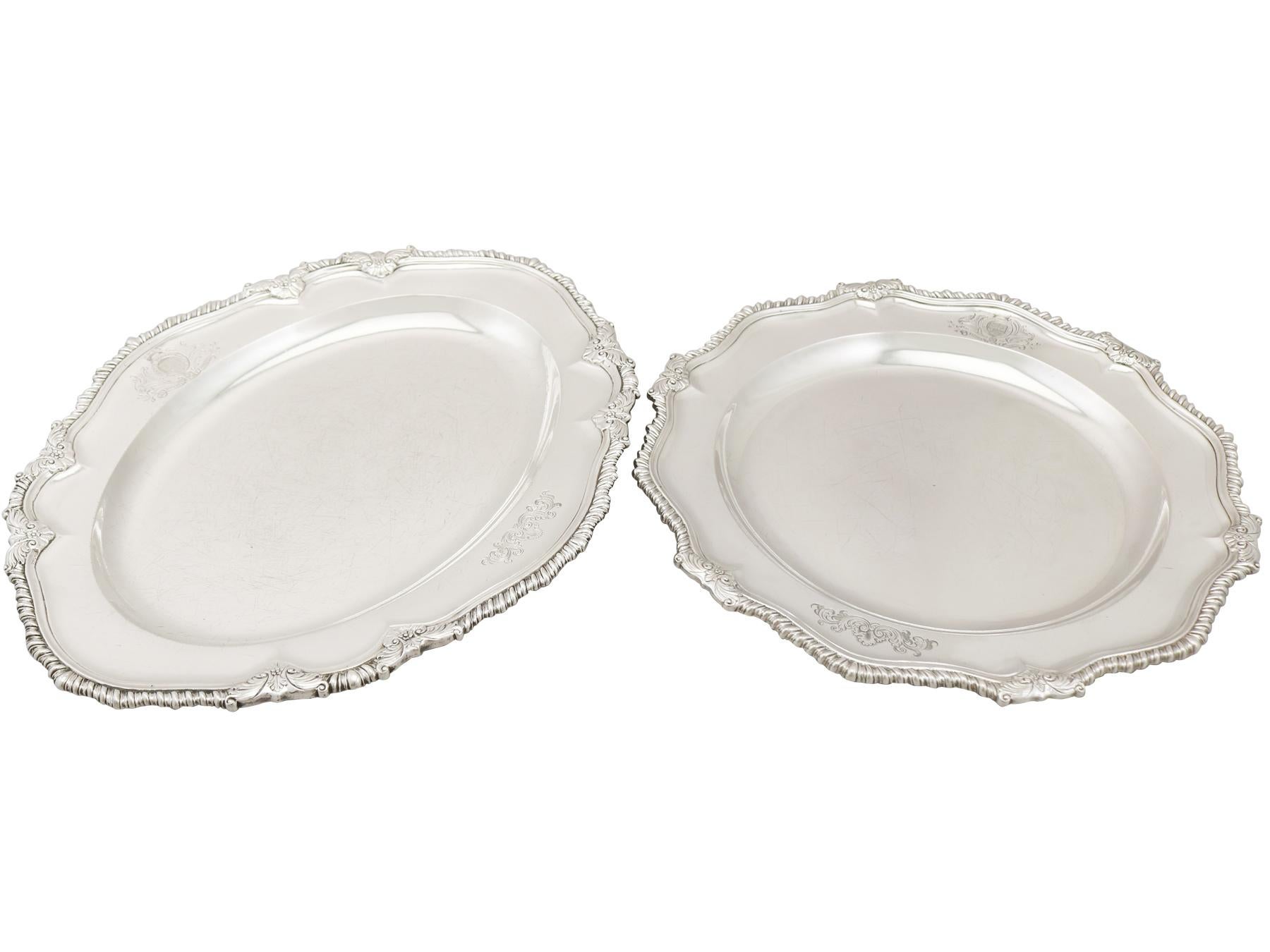 An exceptional, fine and impressive antique Georgian English sterling silver second course dish and meat platter; an addition to our dining silverware collection.

This exceptional antique George II sterling silver second course dish has a plain