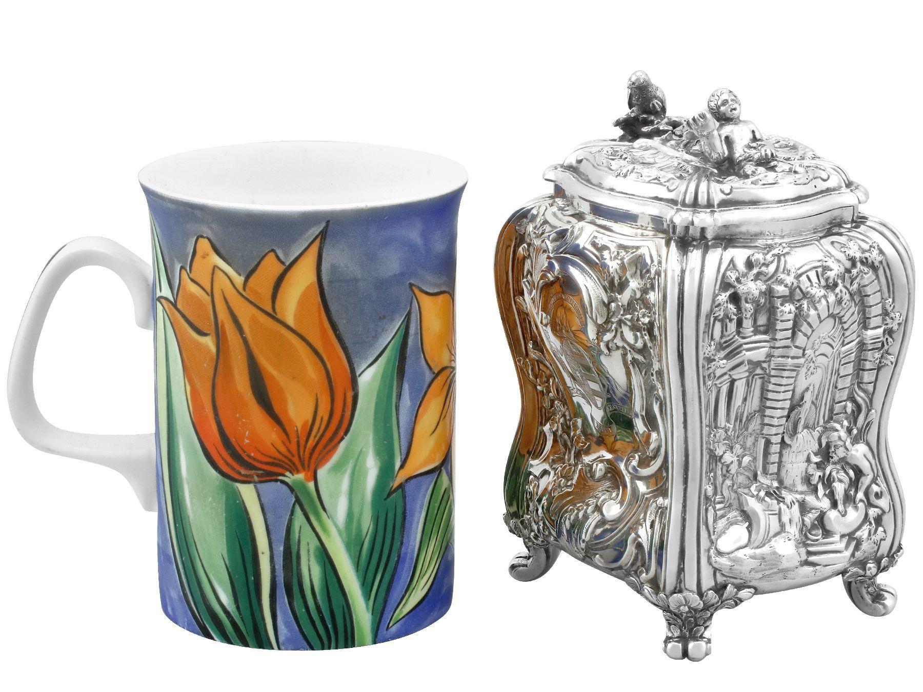 A magnificent, fine and impressive pair of antique Georgian English sterling silver tea caddies - boxed; an addition to our silver teaware collection

These magnificent, fine and impressive antique Georgian silver tea caddies each have an oblong,