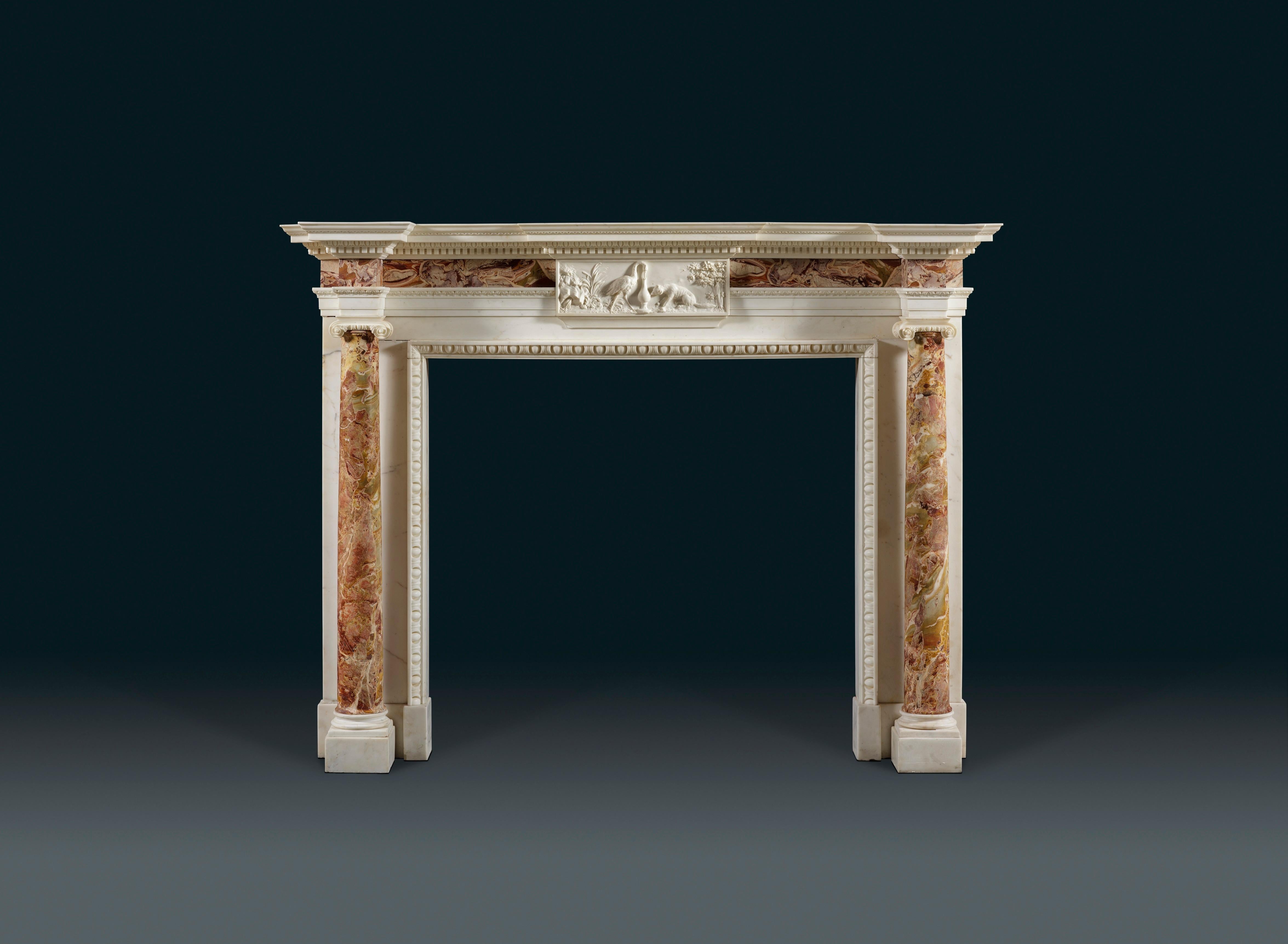 A mid-18th century, George II, white statuary and Sicilian Jasper marble chimneypiece by Thomas Carter I, (1702-1756.) The jambs in the form of full rounded Jasper columns, the frieze with a centre tablet illustrating Aesop’s ‘Stork and Fox’ fable,