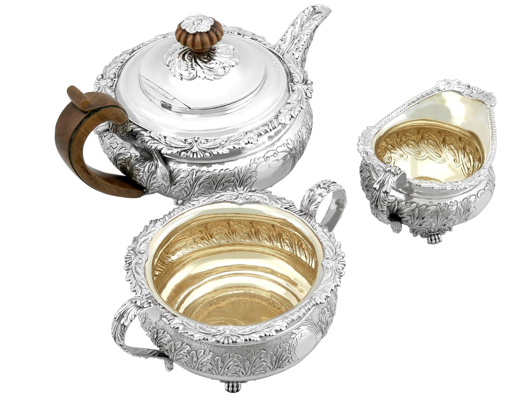 An exceptional, fine and impressive antique Georgian English sterling silver three piece tea service/set made by Joseph Angell I; an addition to our silver teaware collections.

This exceptional antique George III three piece sterling silver tea