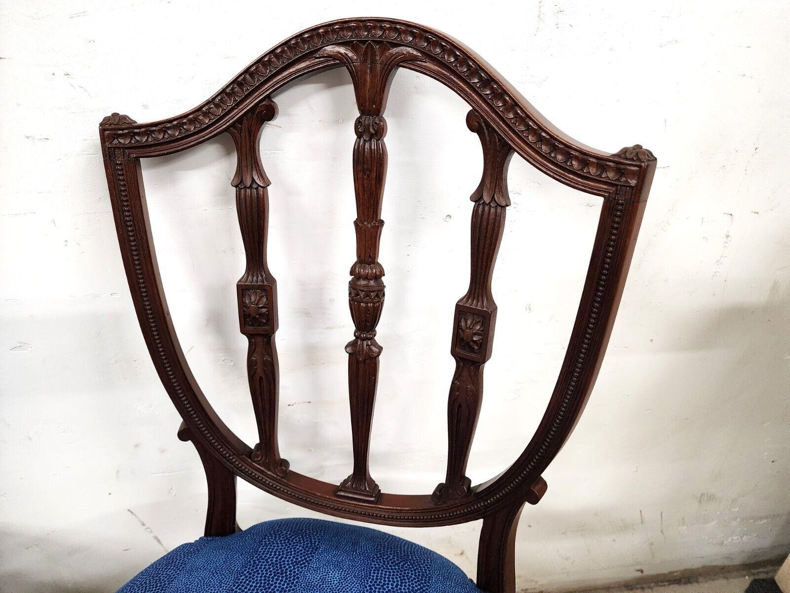 For FULL item description click on CONTINUE READING at the bottom of this page.

Offering one of our recent palm beach estate fine furniture acquisitions of a
set of 2 antique 1800s George III accent side chairs shield back mahogany